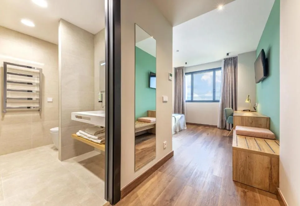 Bed in UNIVERSA Hoteles