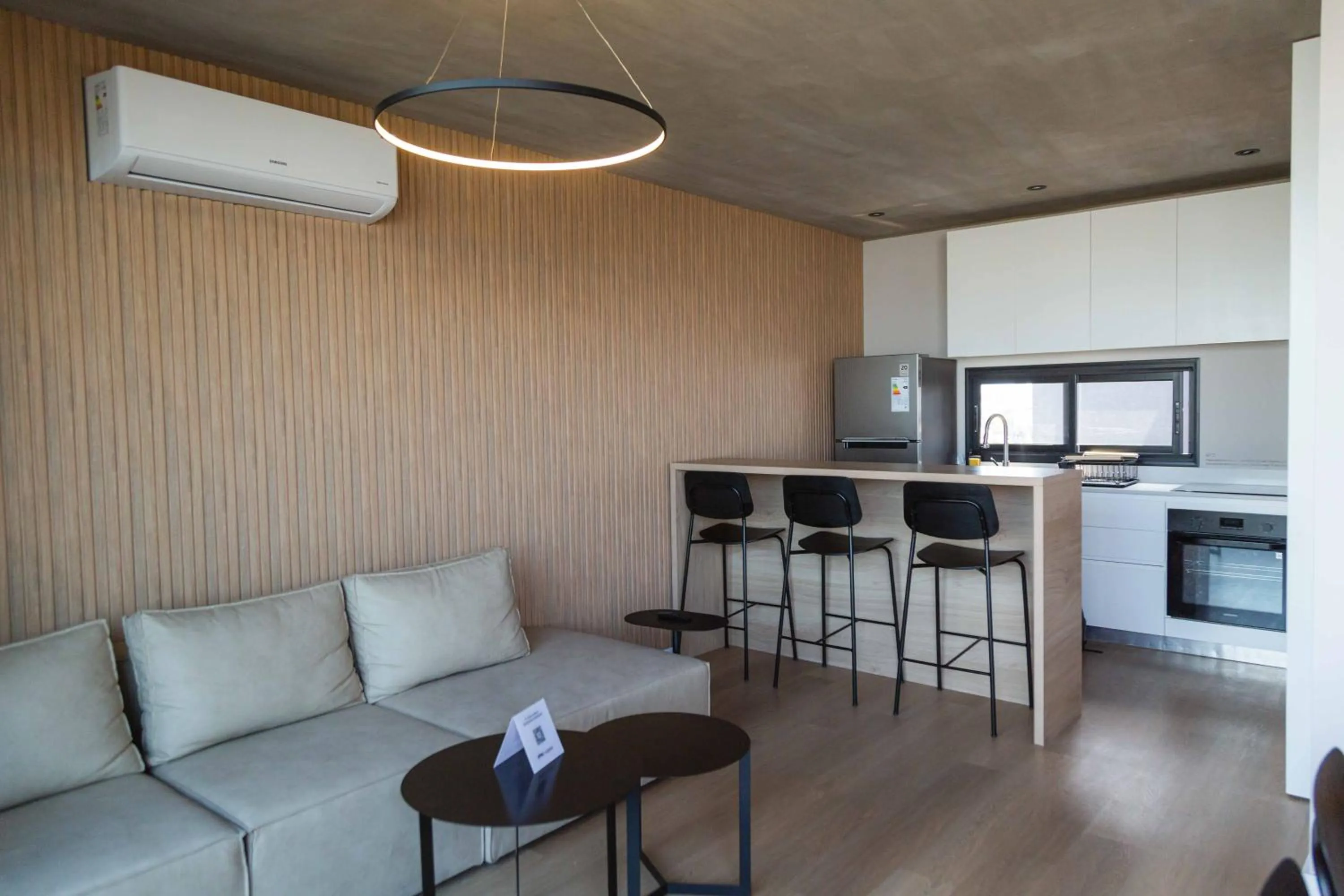 Living room in Milenia Soho by iPPA