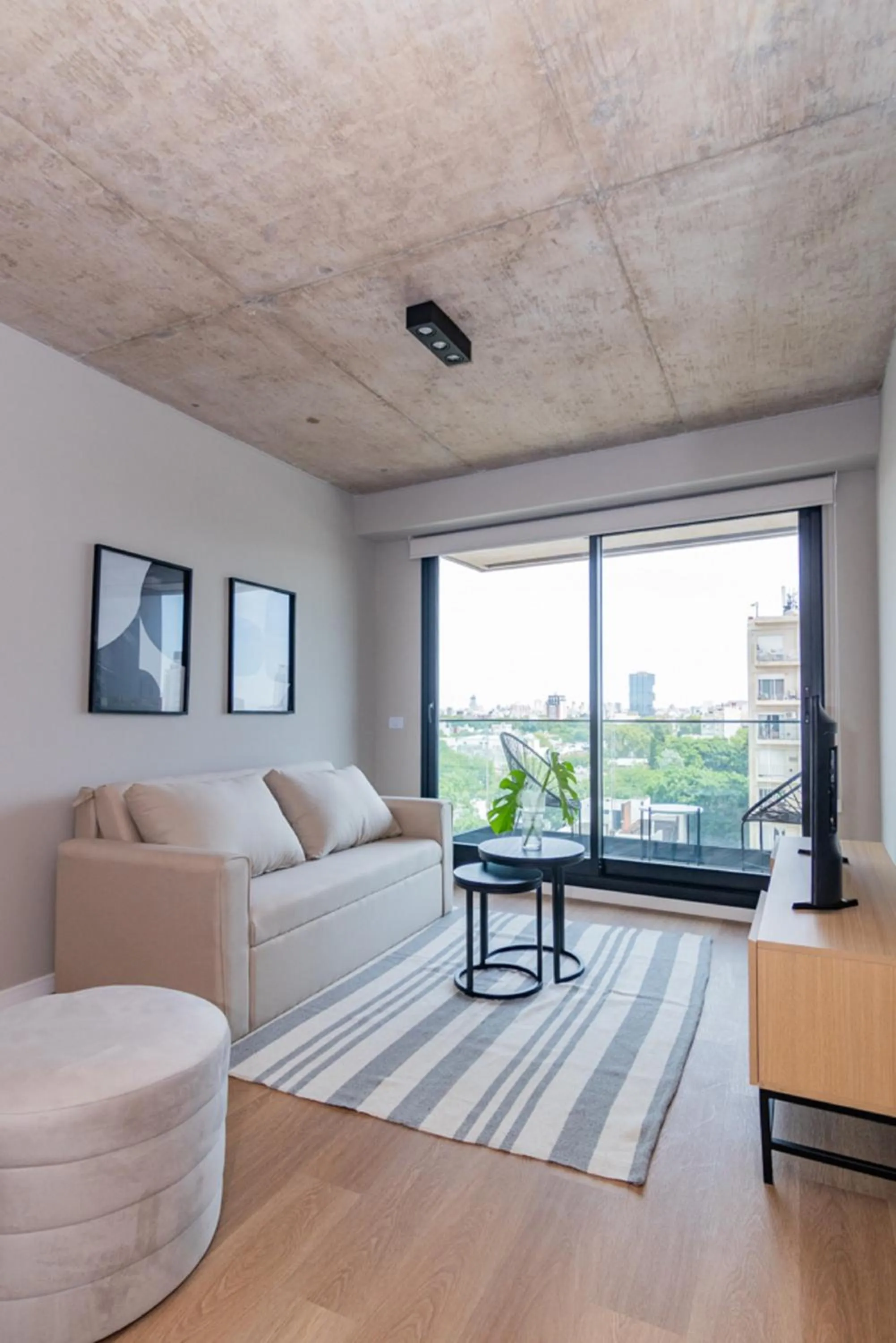 Seating area in Milenia Soho by iPPA