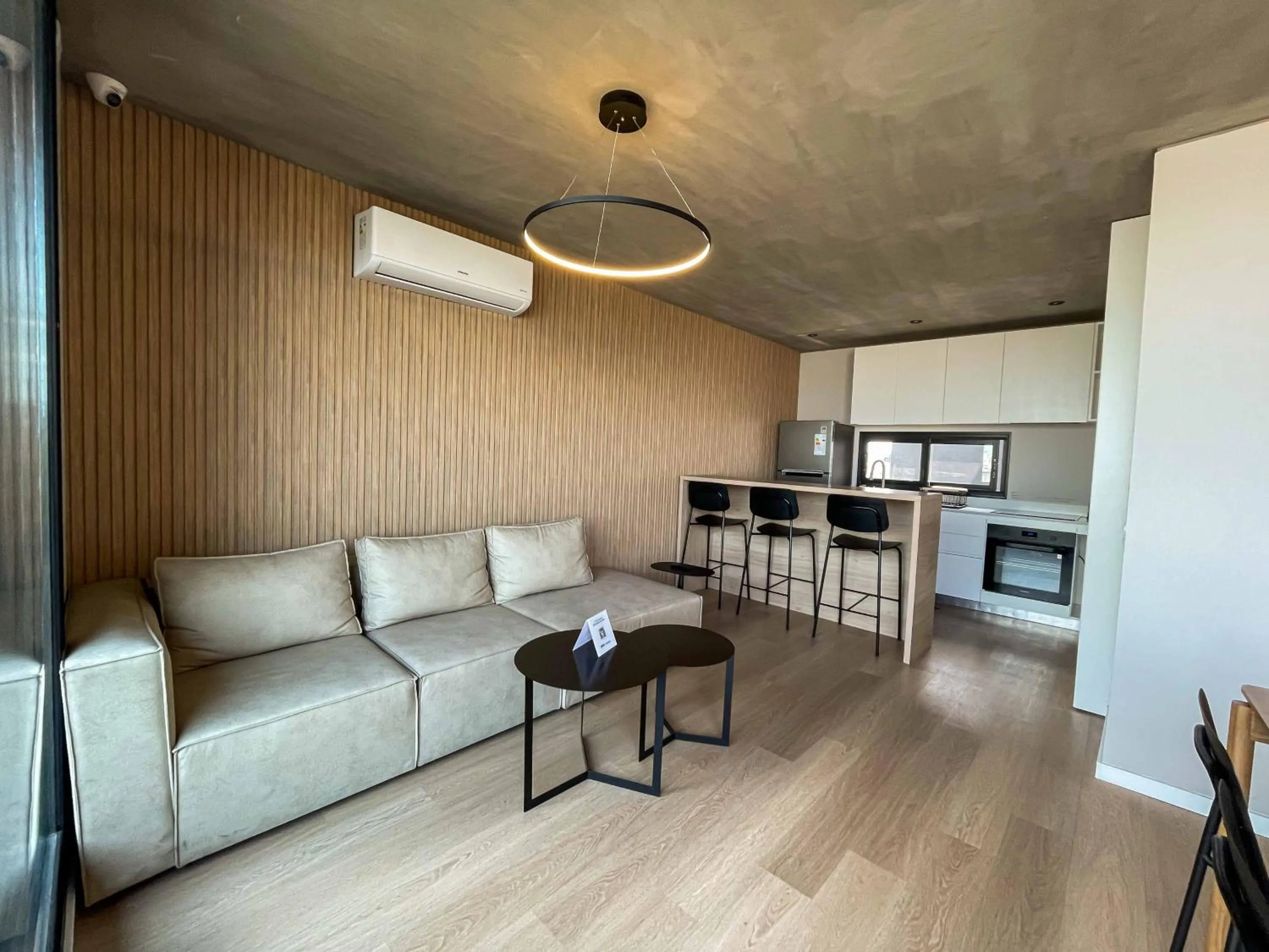 Seating area in Milenia Soho by iPPA