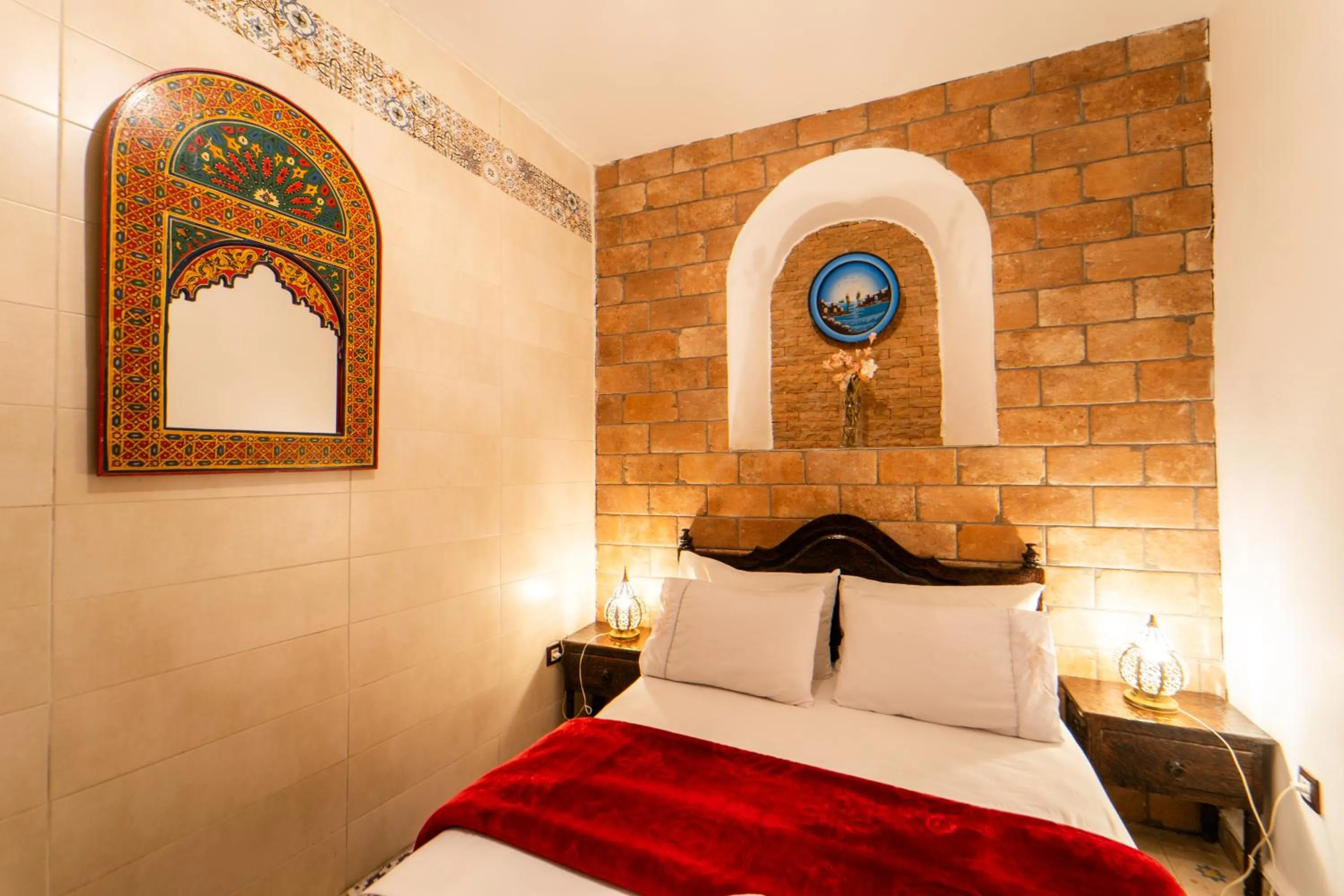 Bed in DAR NOKHBA INN