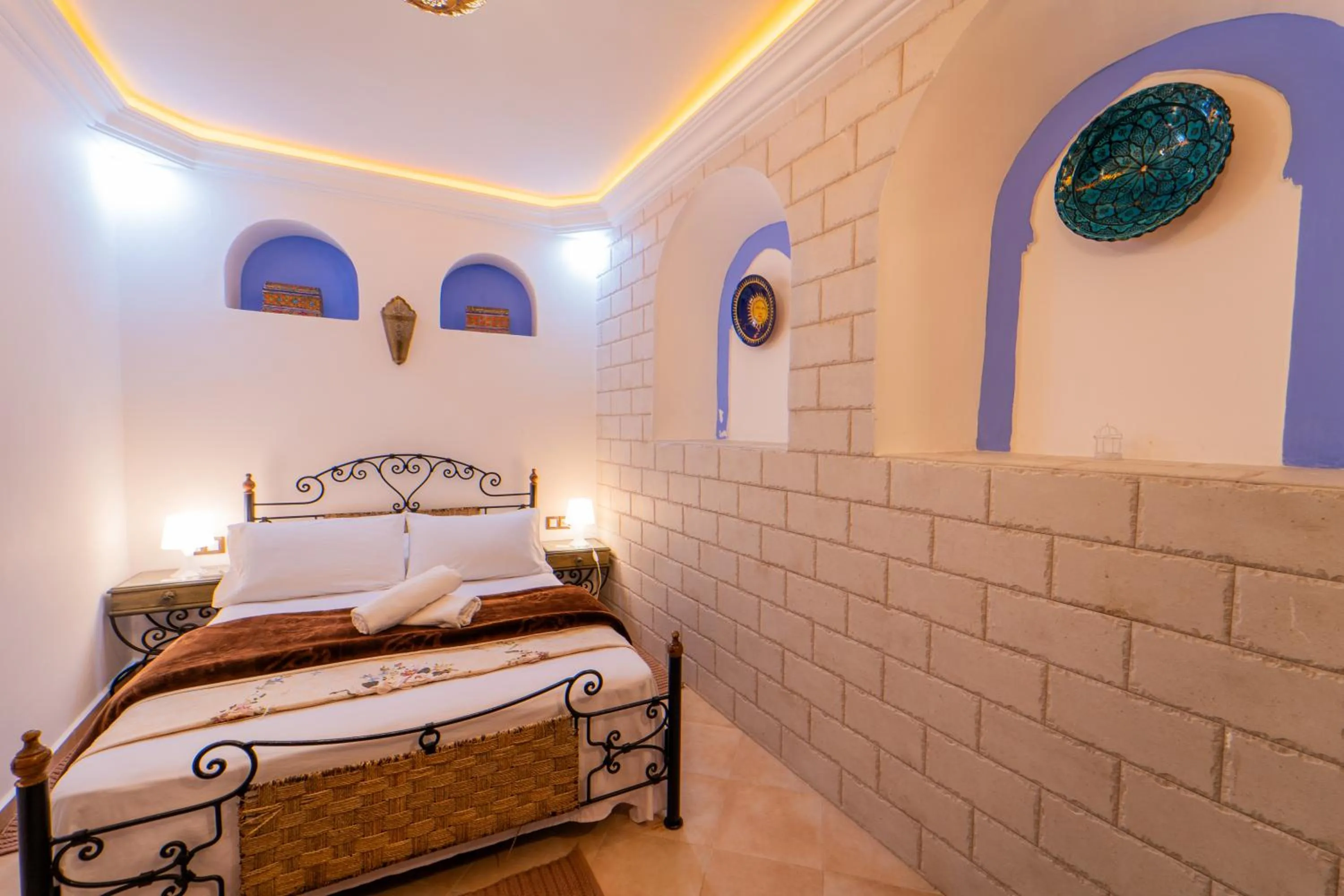 Bed in DAR NOKHBA INN