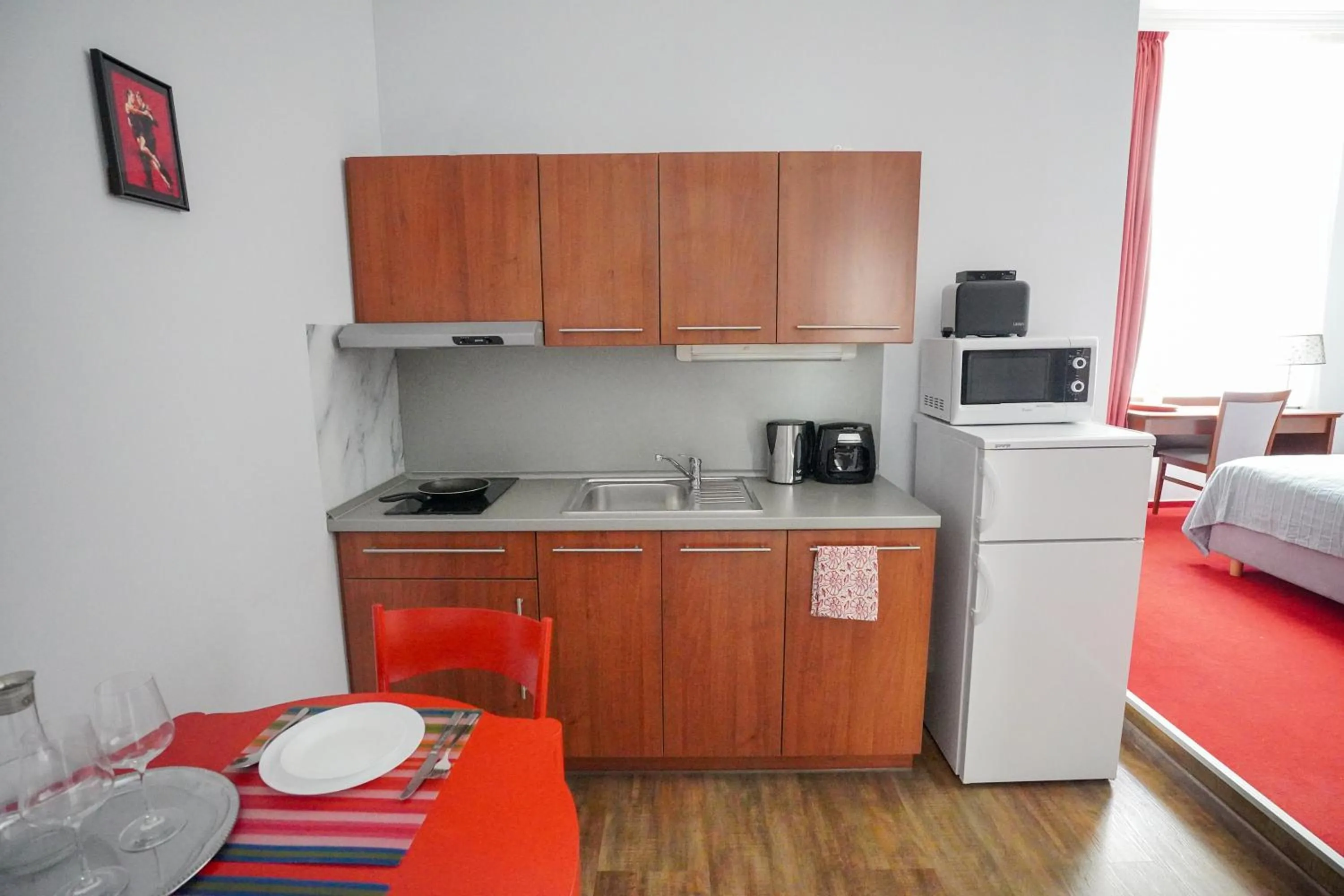 Kitchen or kitchenette, Bed in Elegant & Stylish Center Apartments!