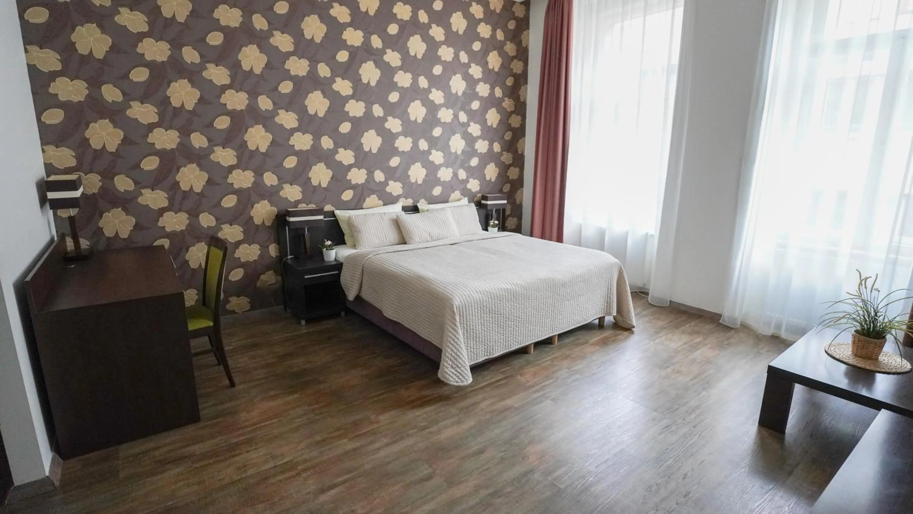 Photo of the whole room, Bed in Elegant & Stylish Center Apartments!