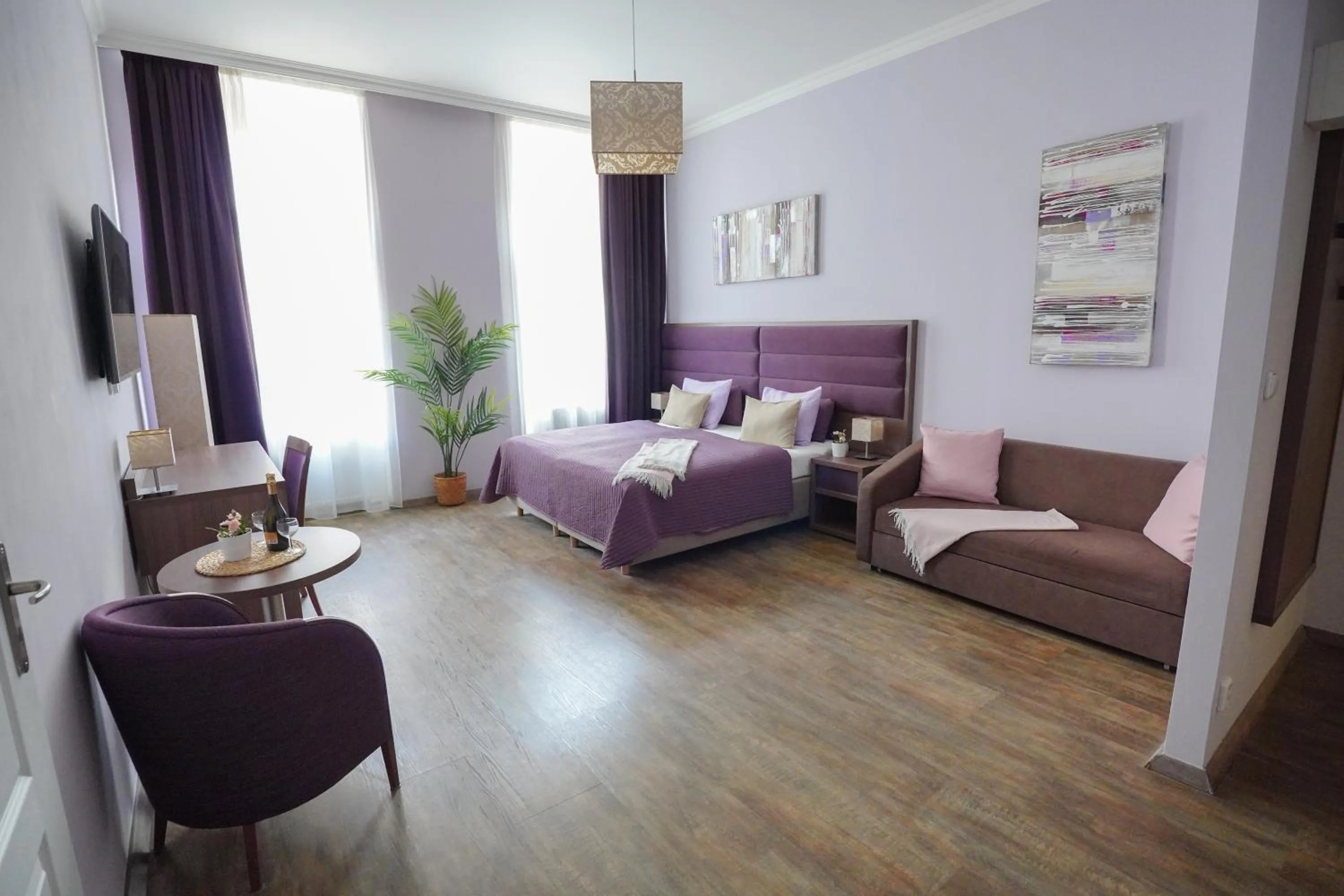 Photo of the whole room, Bed in Elegant & Stylish Center Apartments!