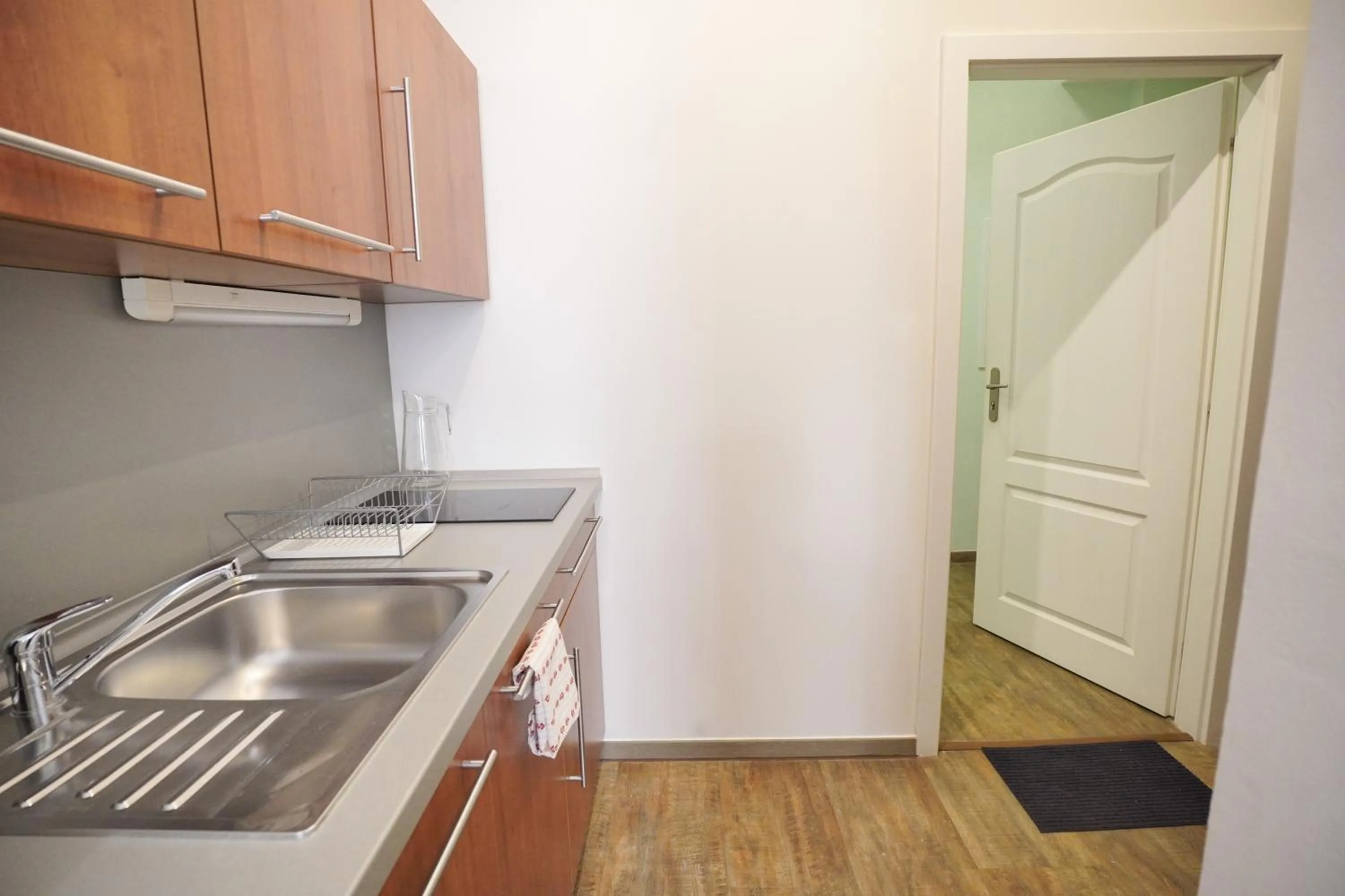 Kitchen or kitchenette in Elegant & Stylish Center Apartments!
