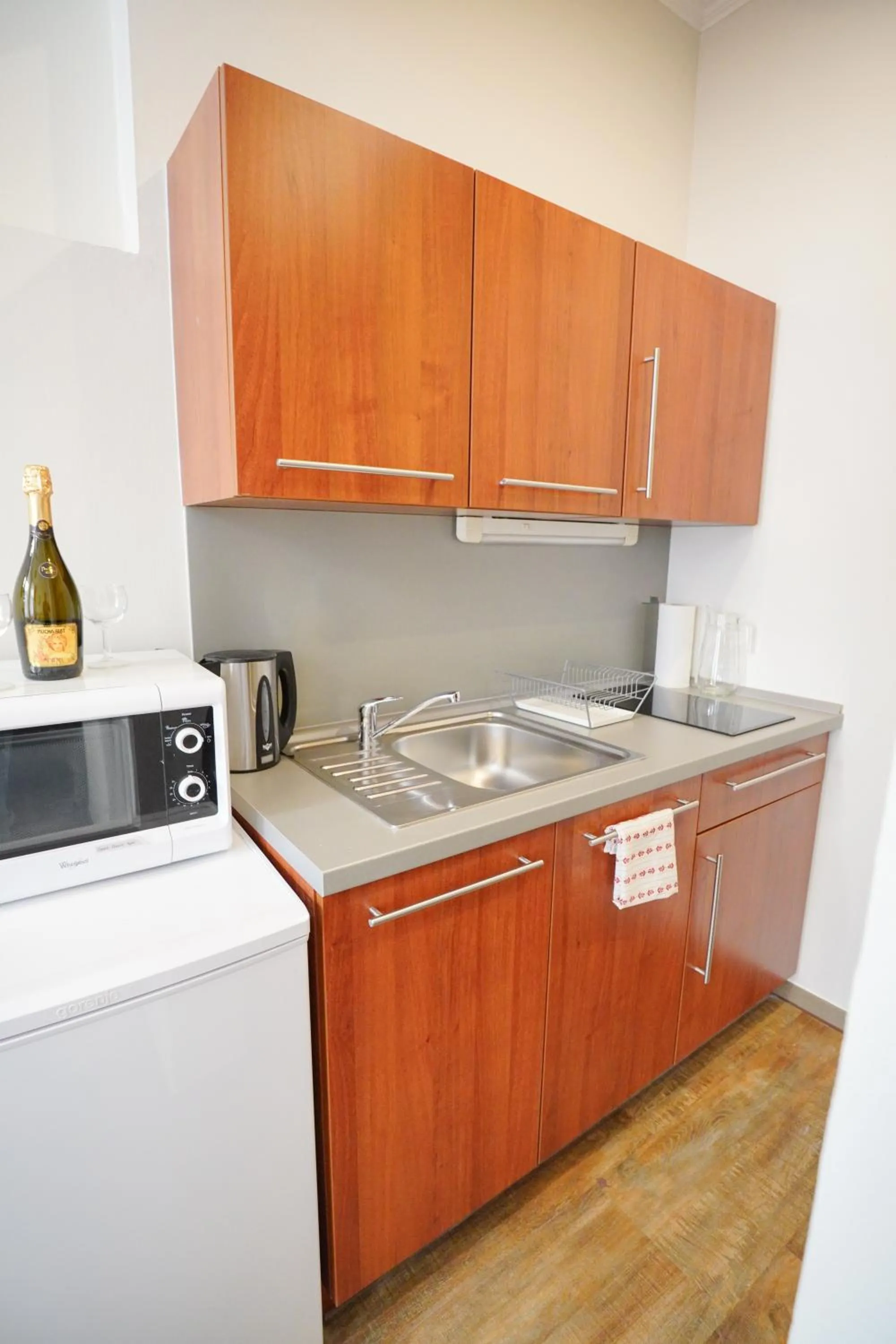 Kitchen or kitchenette in Elegant & Stylish Center Apartments!