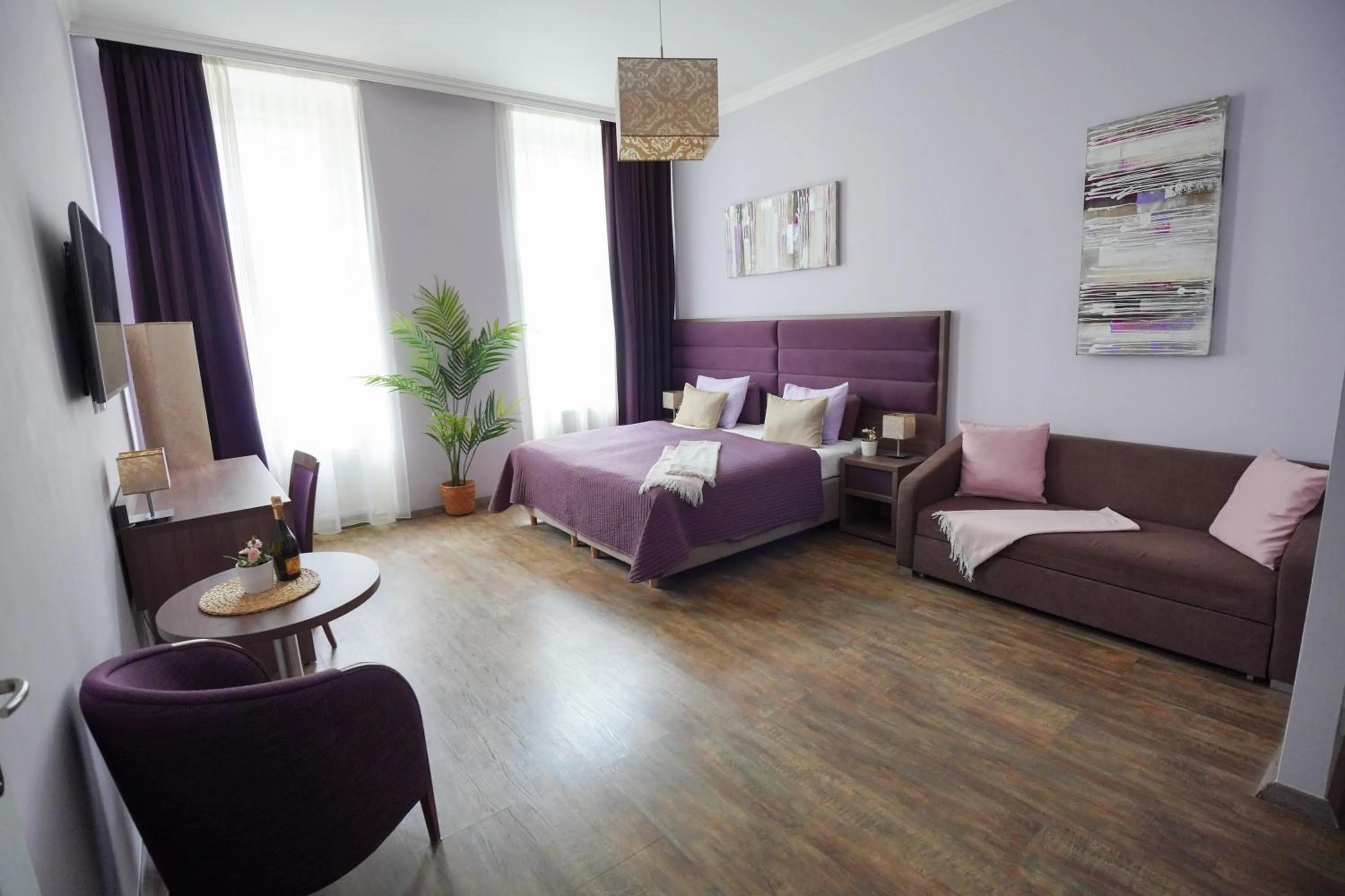 Photo of the whole room, Bed in Elegant & Stylish Center Apartments!