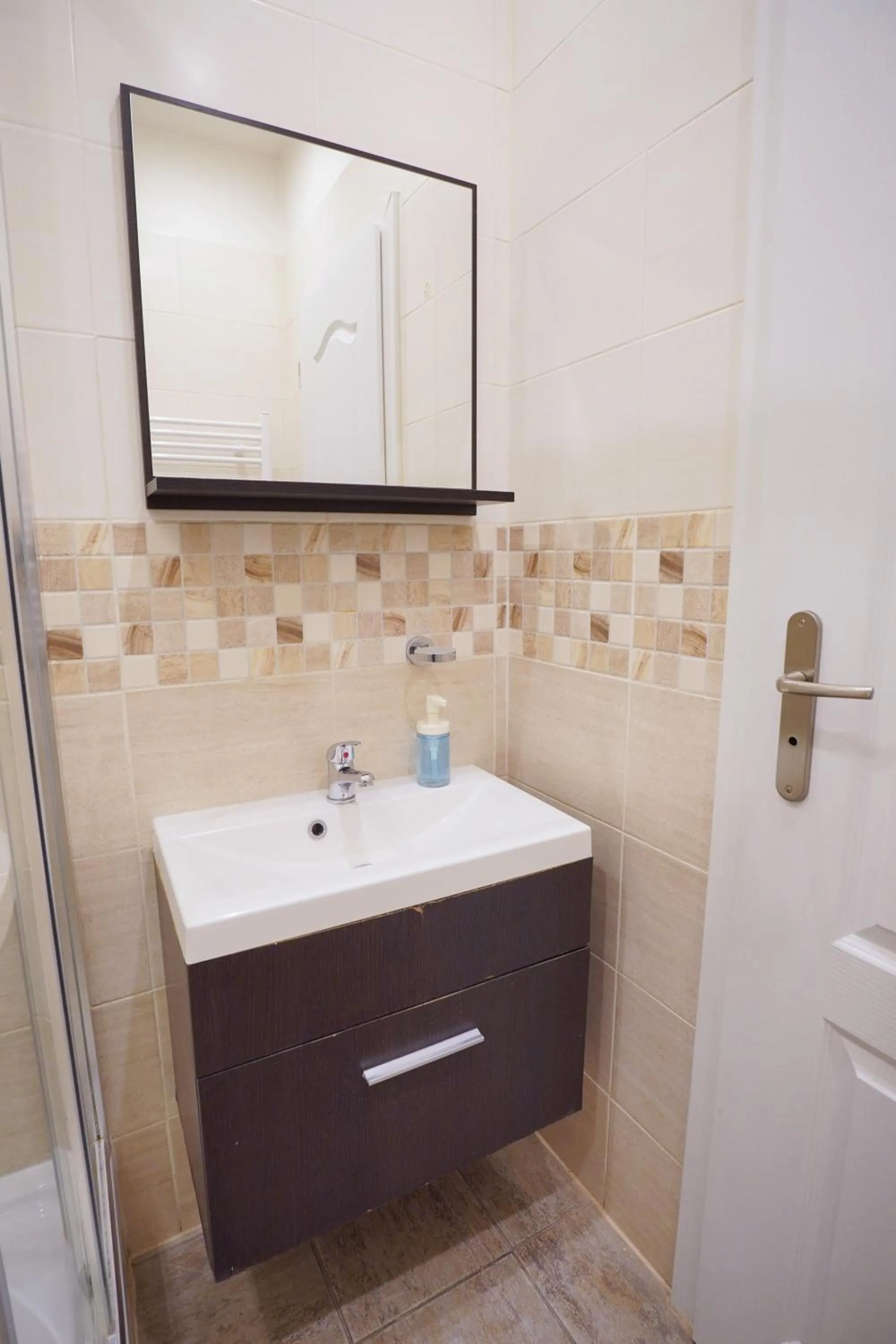 Bathroom in Elegant & Stylish Center Apartments!