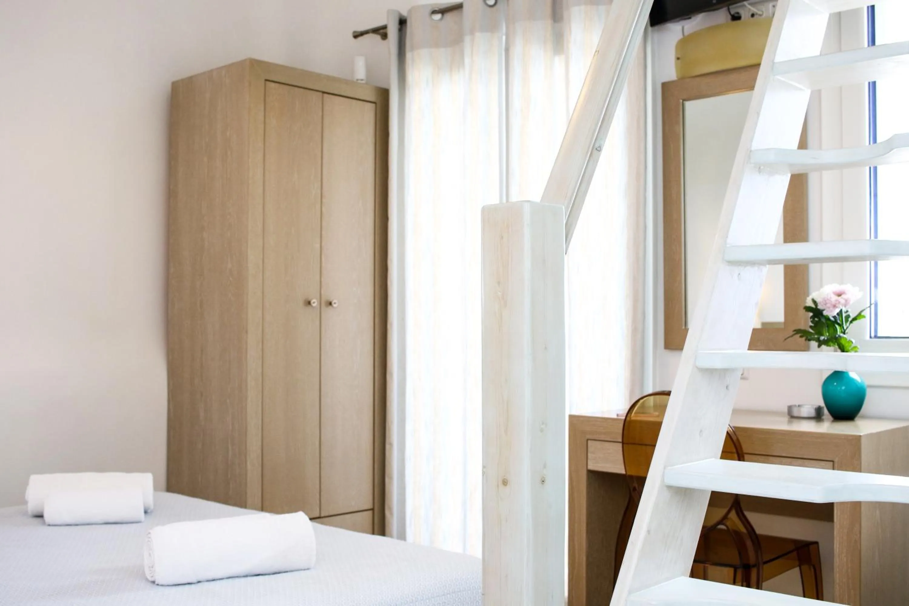 Bedroom, Bed in Niriides Homes & Villas