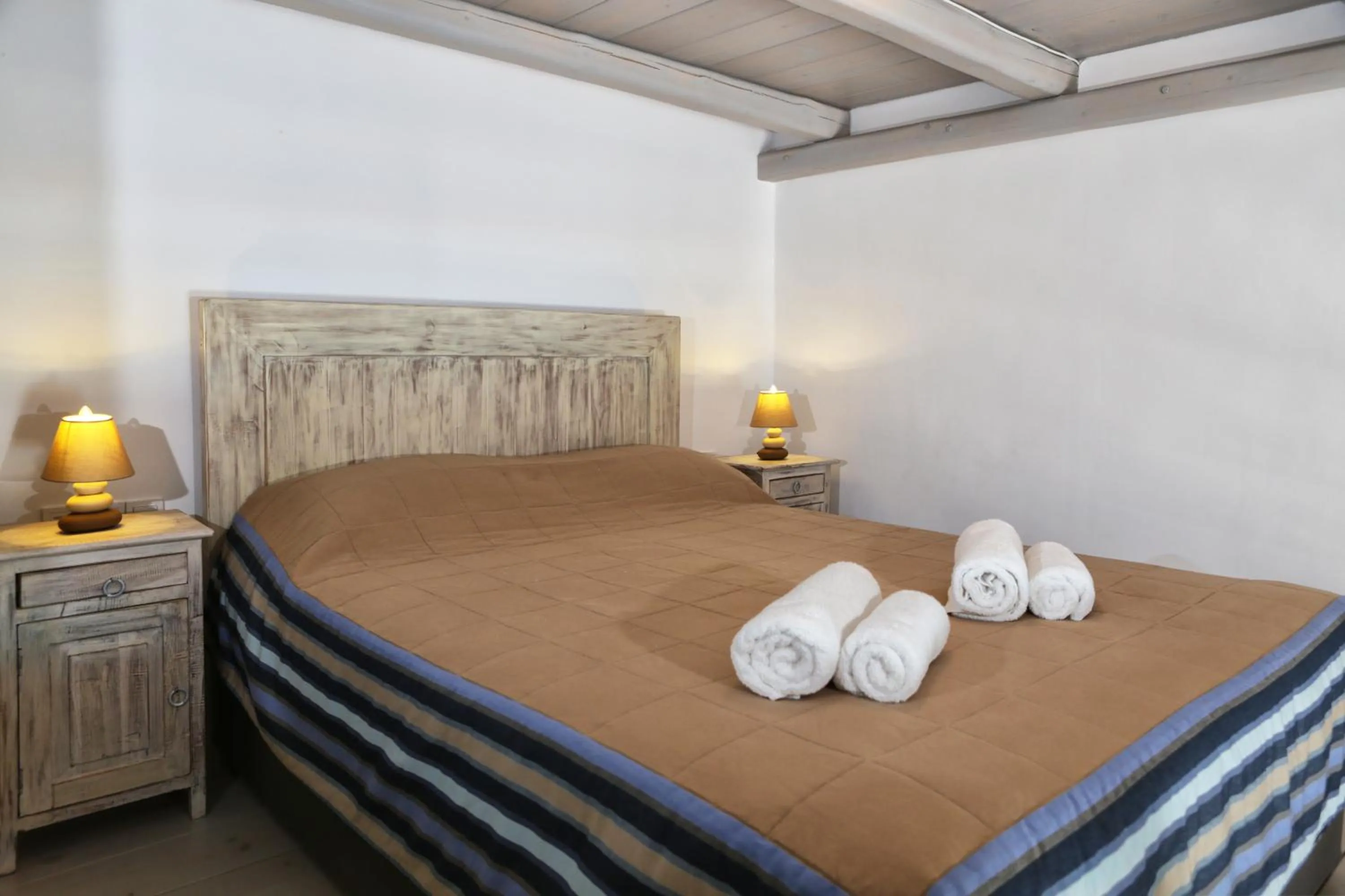 Bedroom, Bed in Niriides Homes & Villas