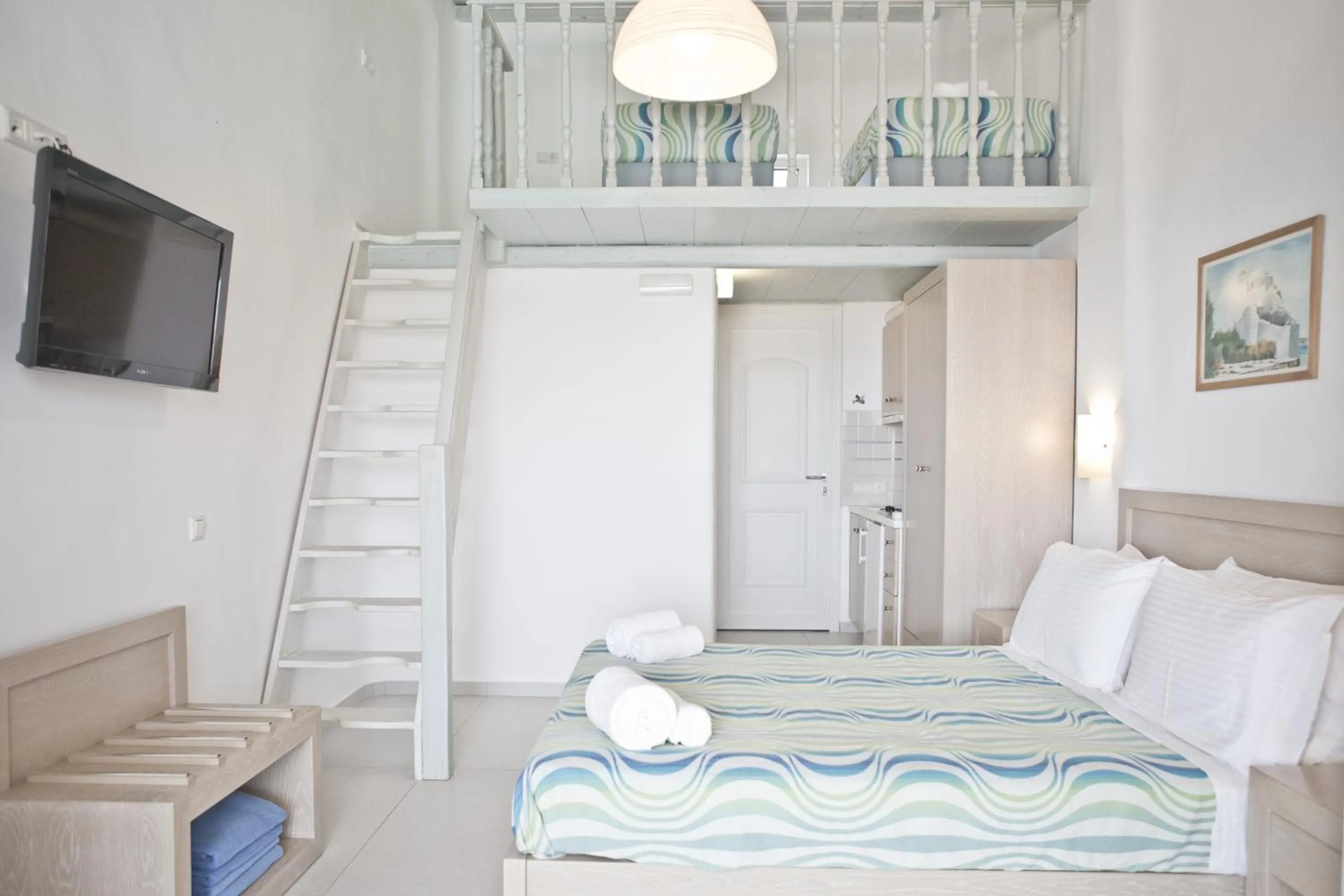 Bed in Niriides Homes & Villas