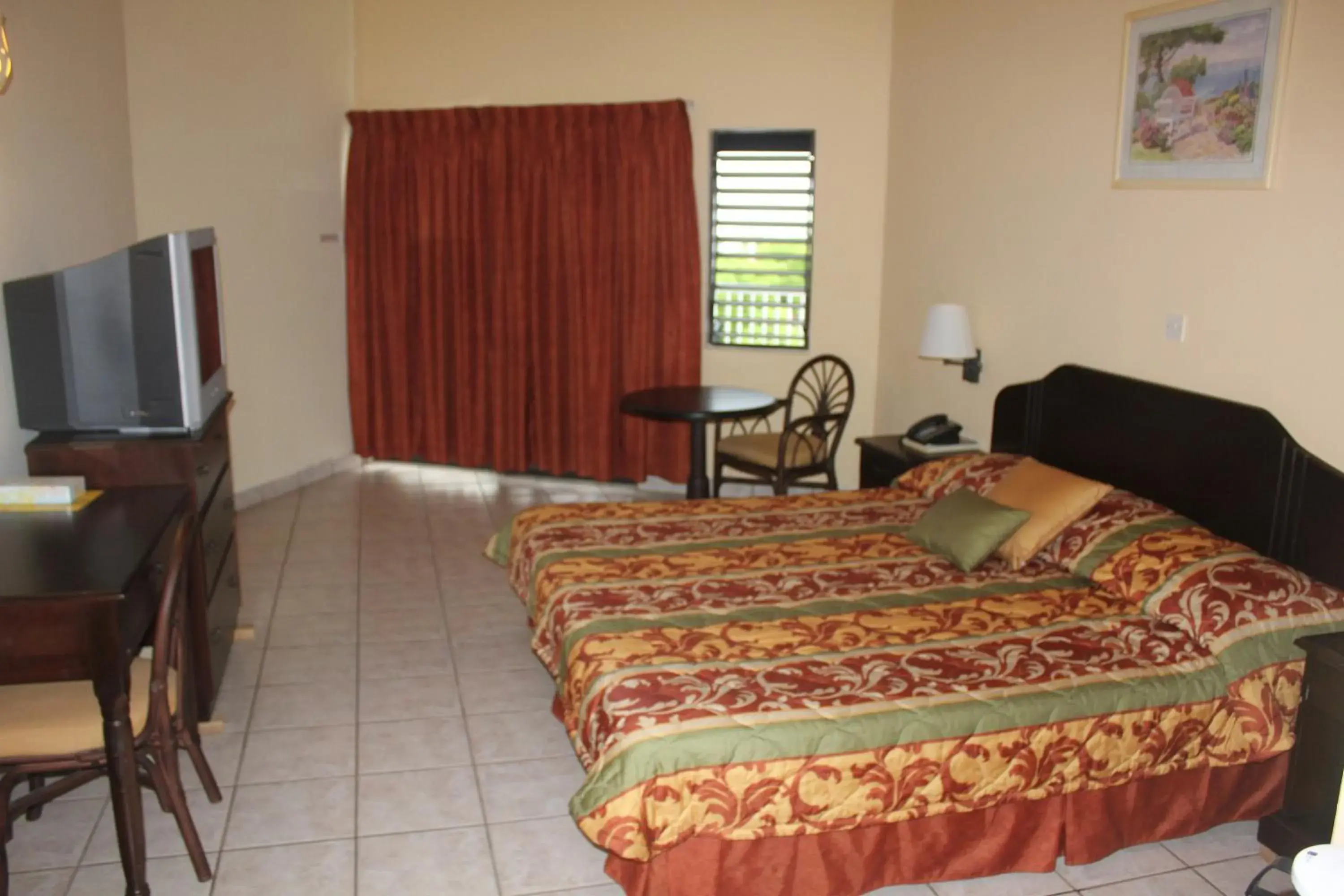 Photo of the whole room, Bed in Allamanda Beach Resort Photo of the whole room, Bed in Allamanda Beach Resort