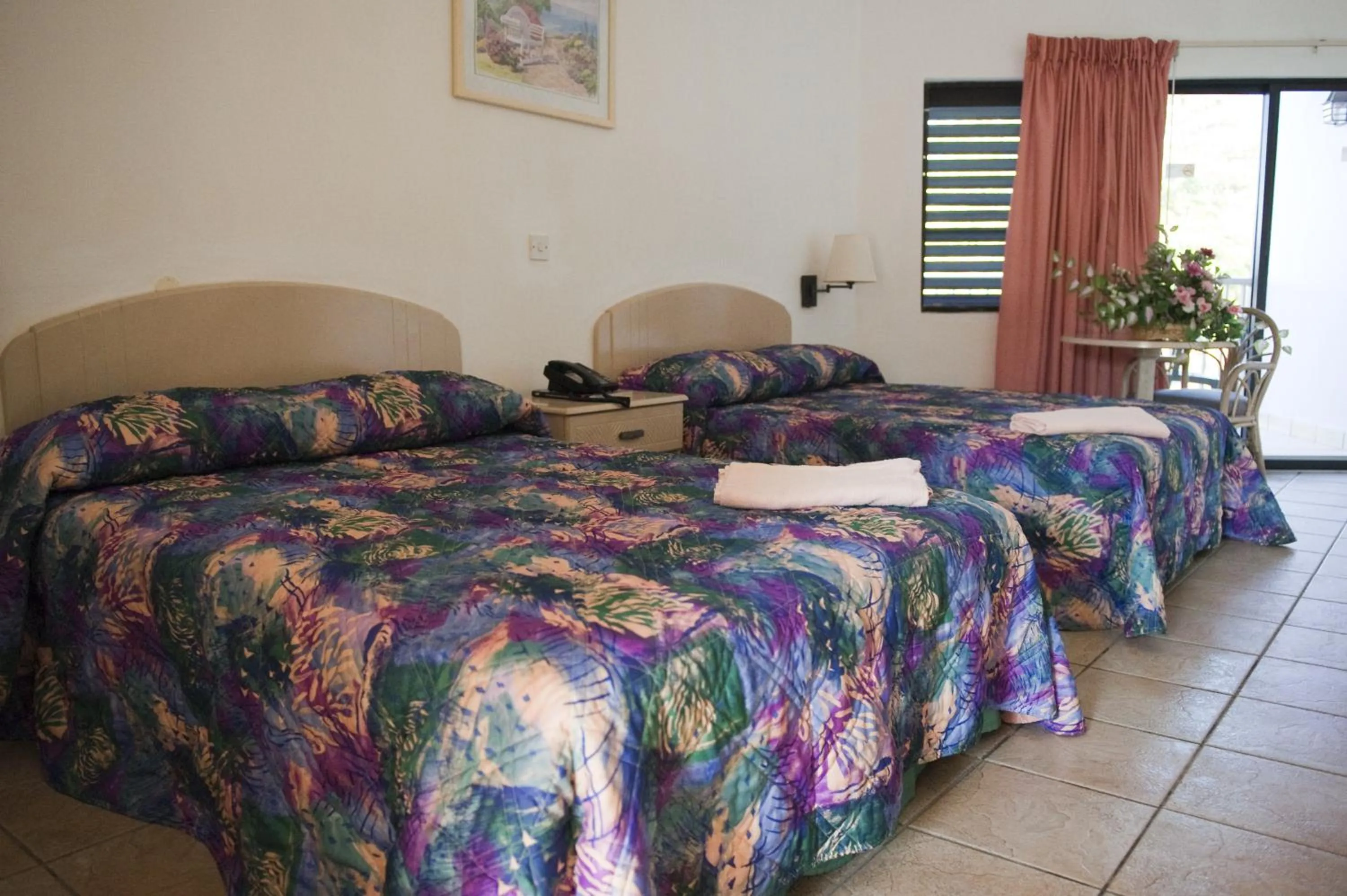 Photo of the whole room, Bed in Allamanda Beach Resort