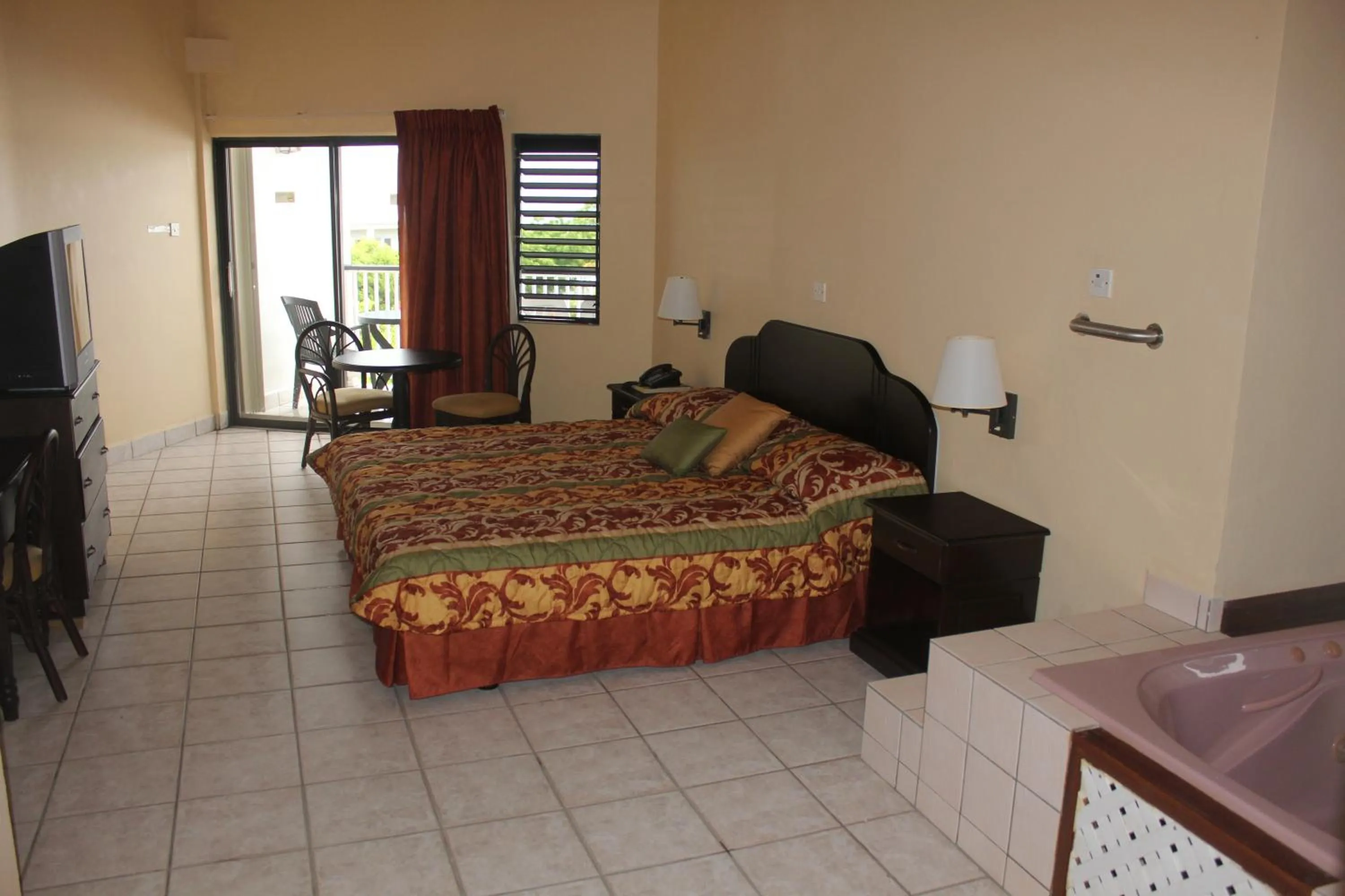 Photo of the whole room, Bed in Allamanda Beach Resort