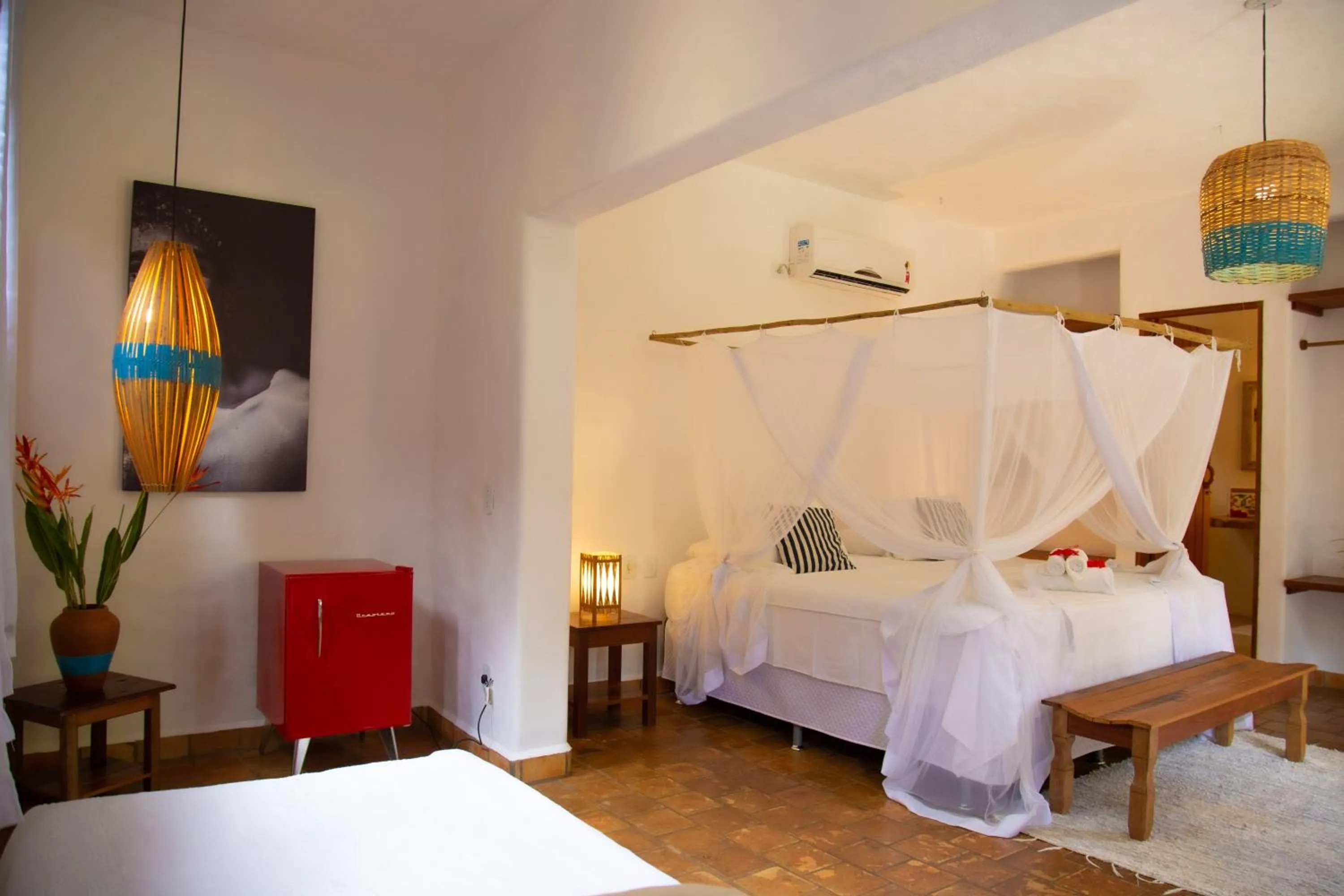 Bed in Pousada Le Refuge