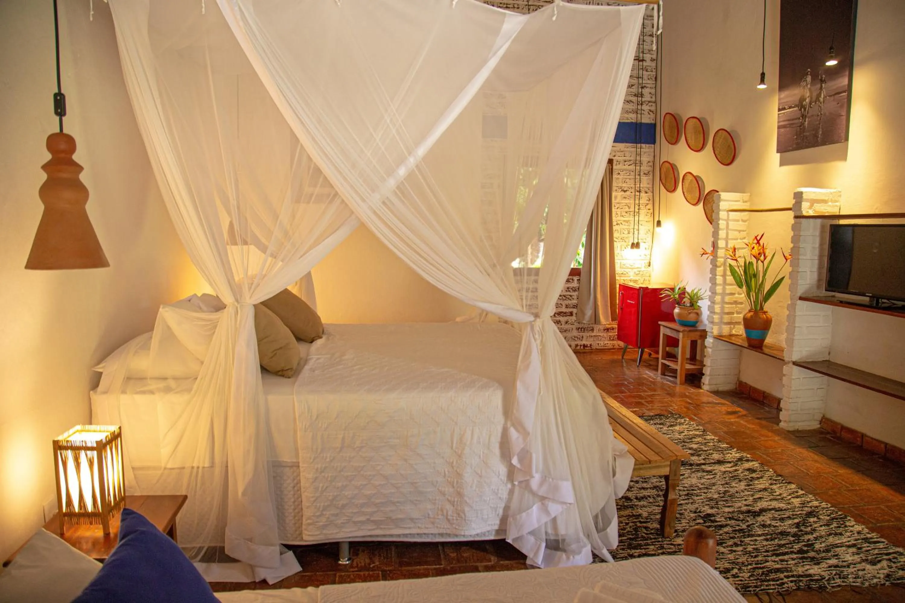 Bed in Pousada Le Refuge