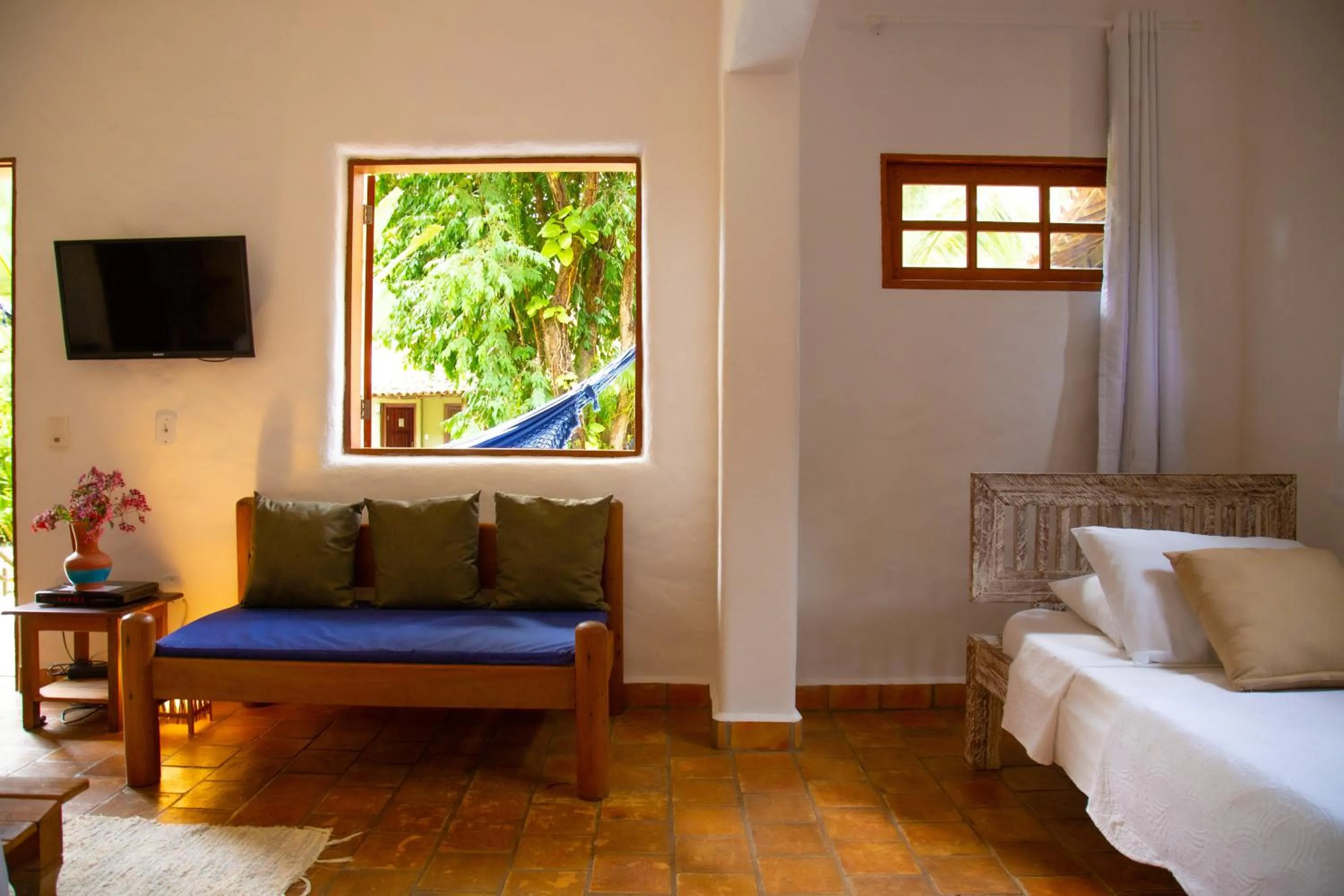 Bed in Pousada Le Refuge