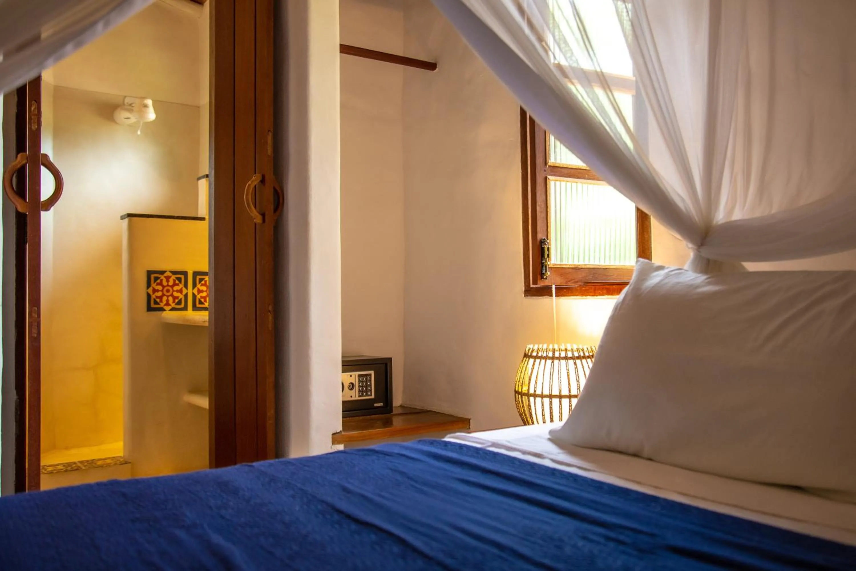 Bed in Pousada Le Refuge