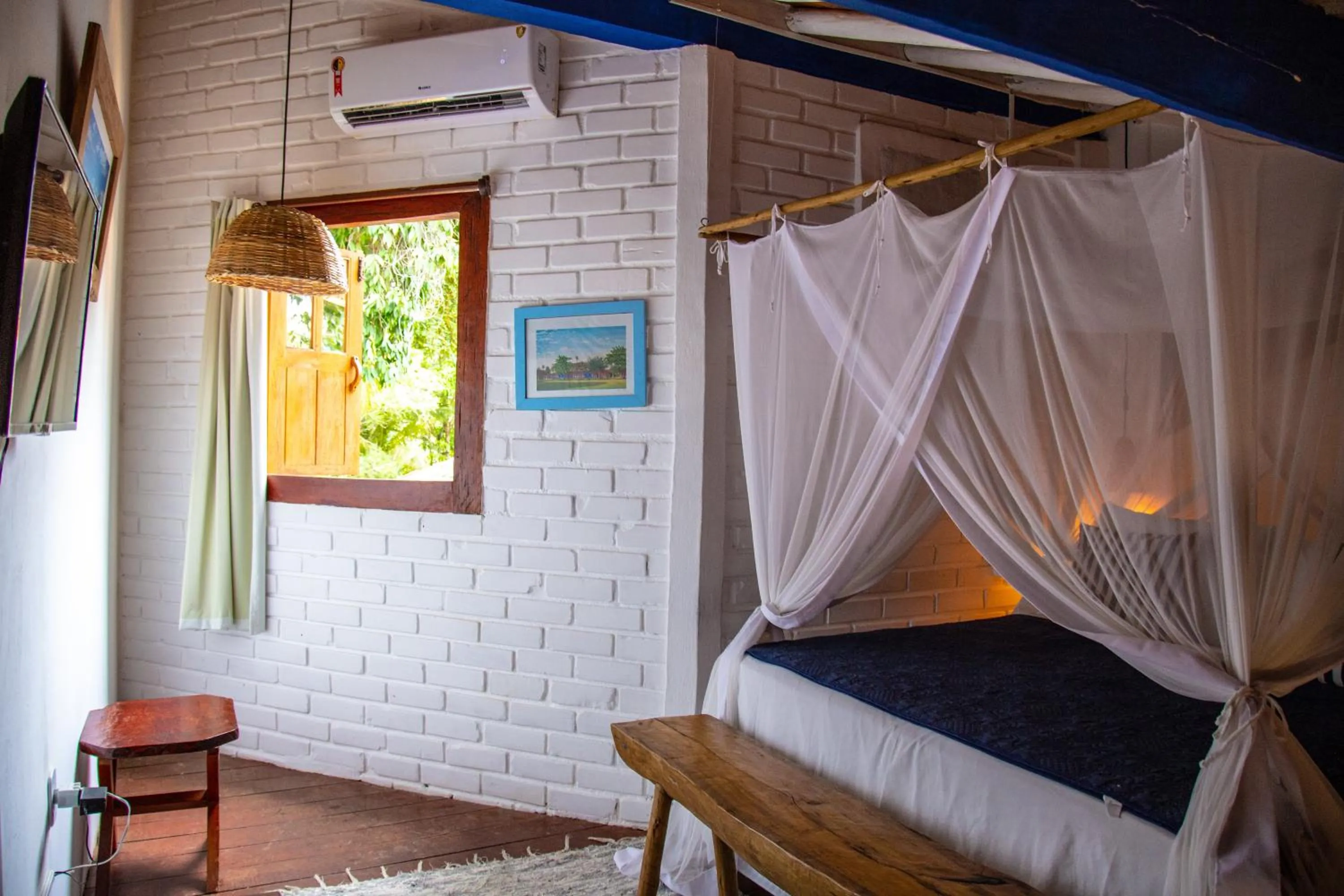 Bed in Pousada Le Refuge