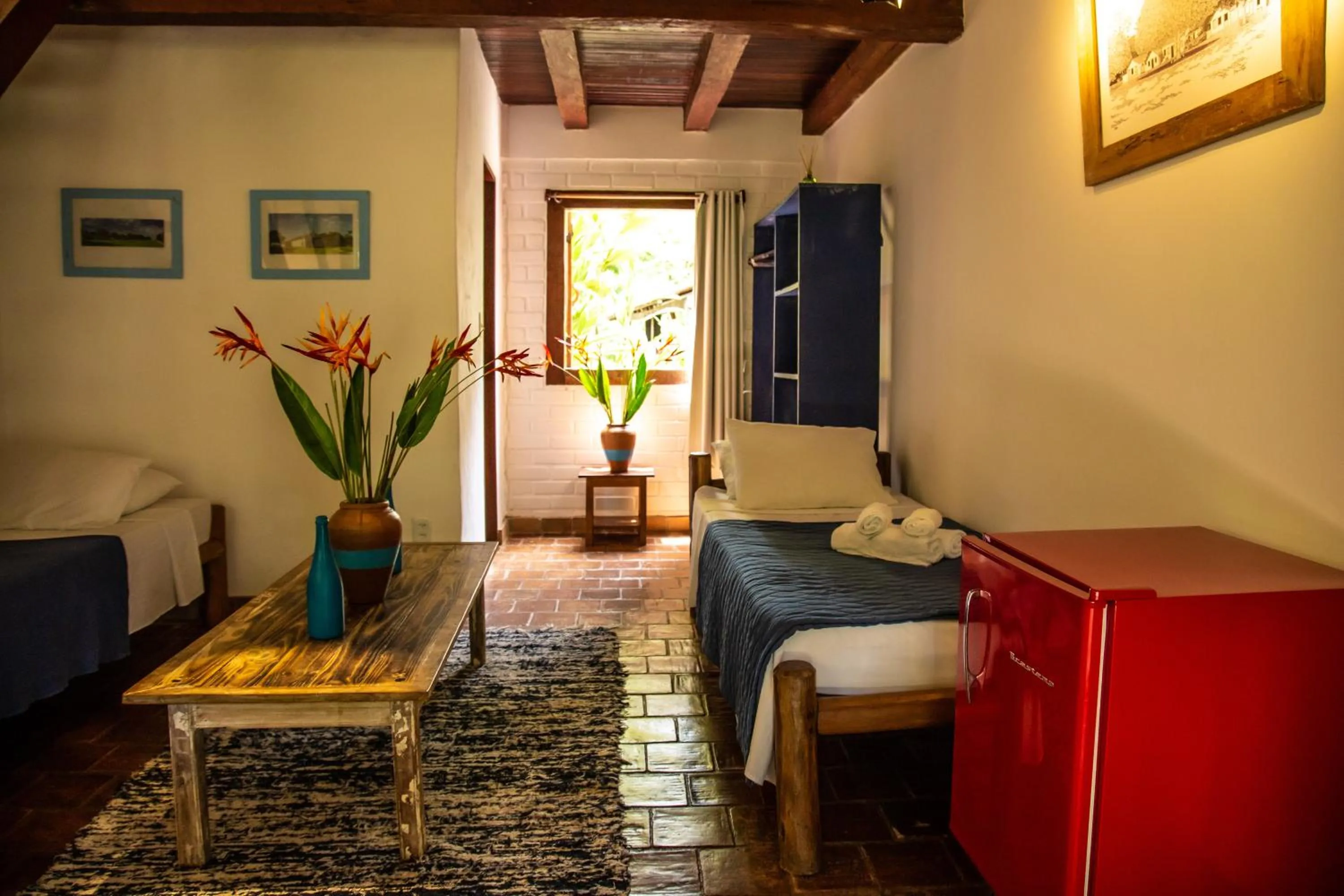Bed in Pousada Le Refuge