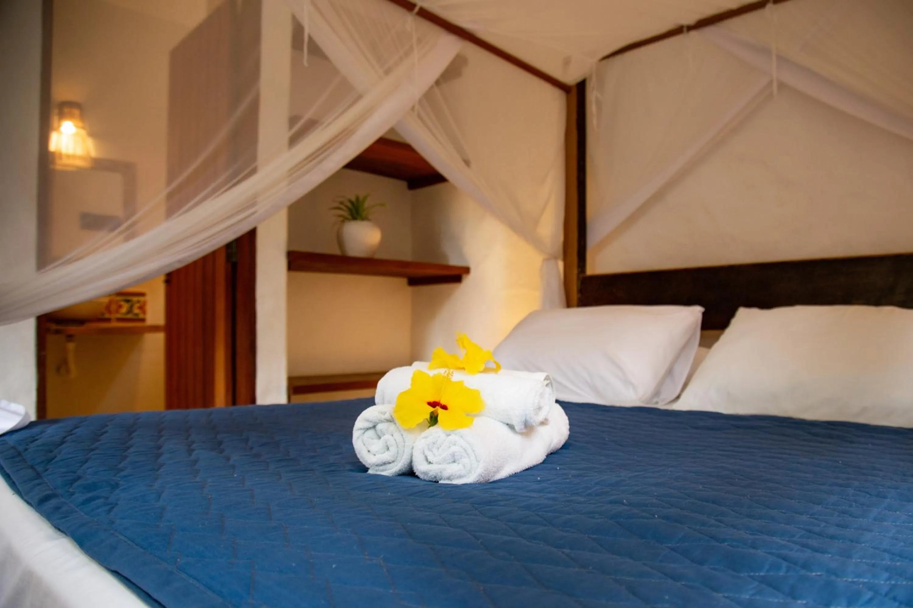 Bed in Pousada Le Refuge