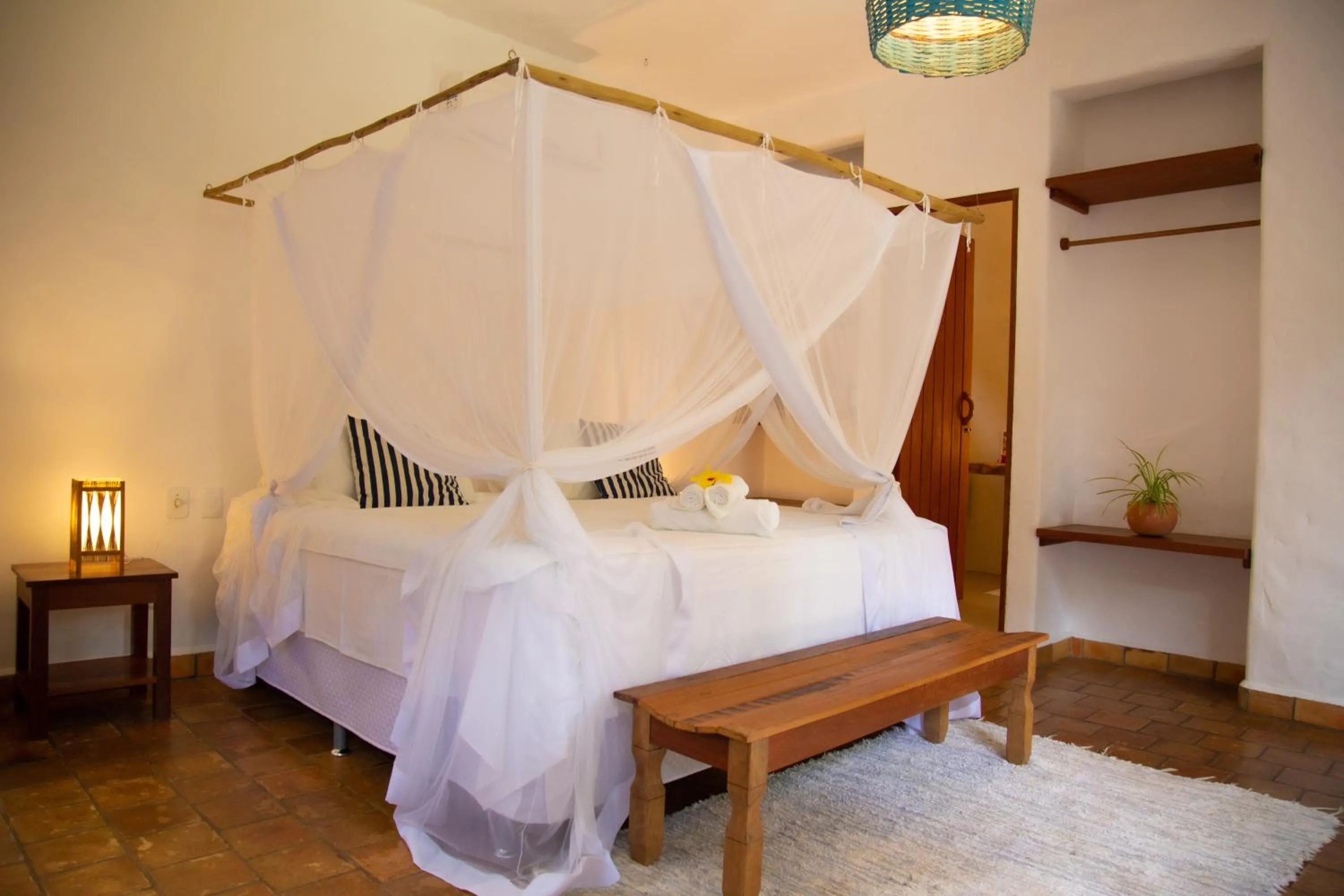 Bed in Pousada Le Refuge