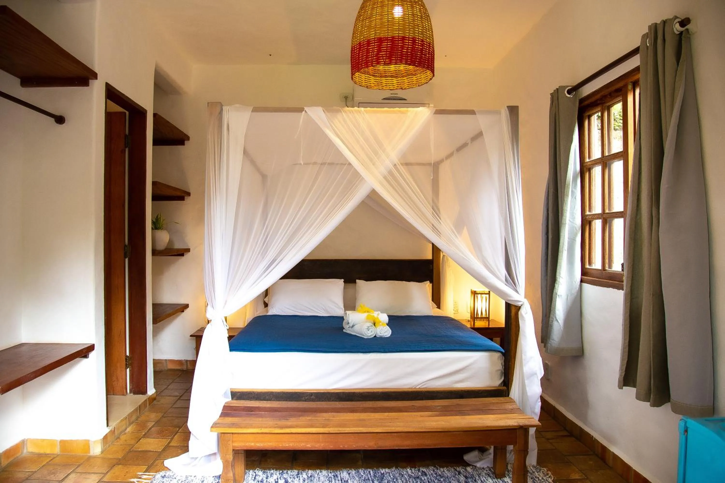 Bed in Pousada Le Refuge