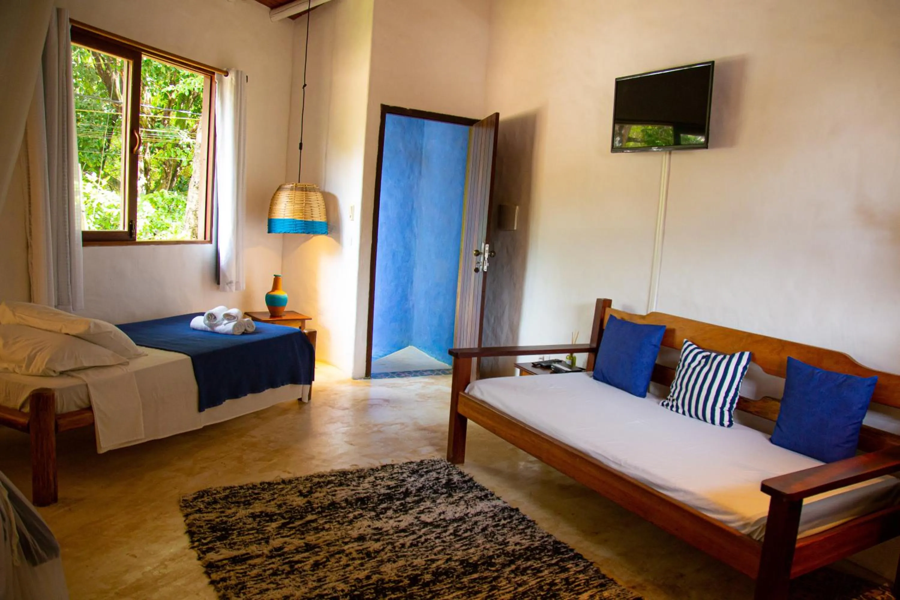 Bed in Pousada Le Refuge