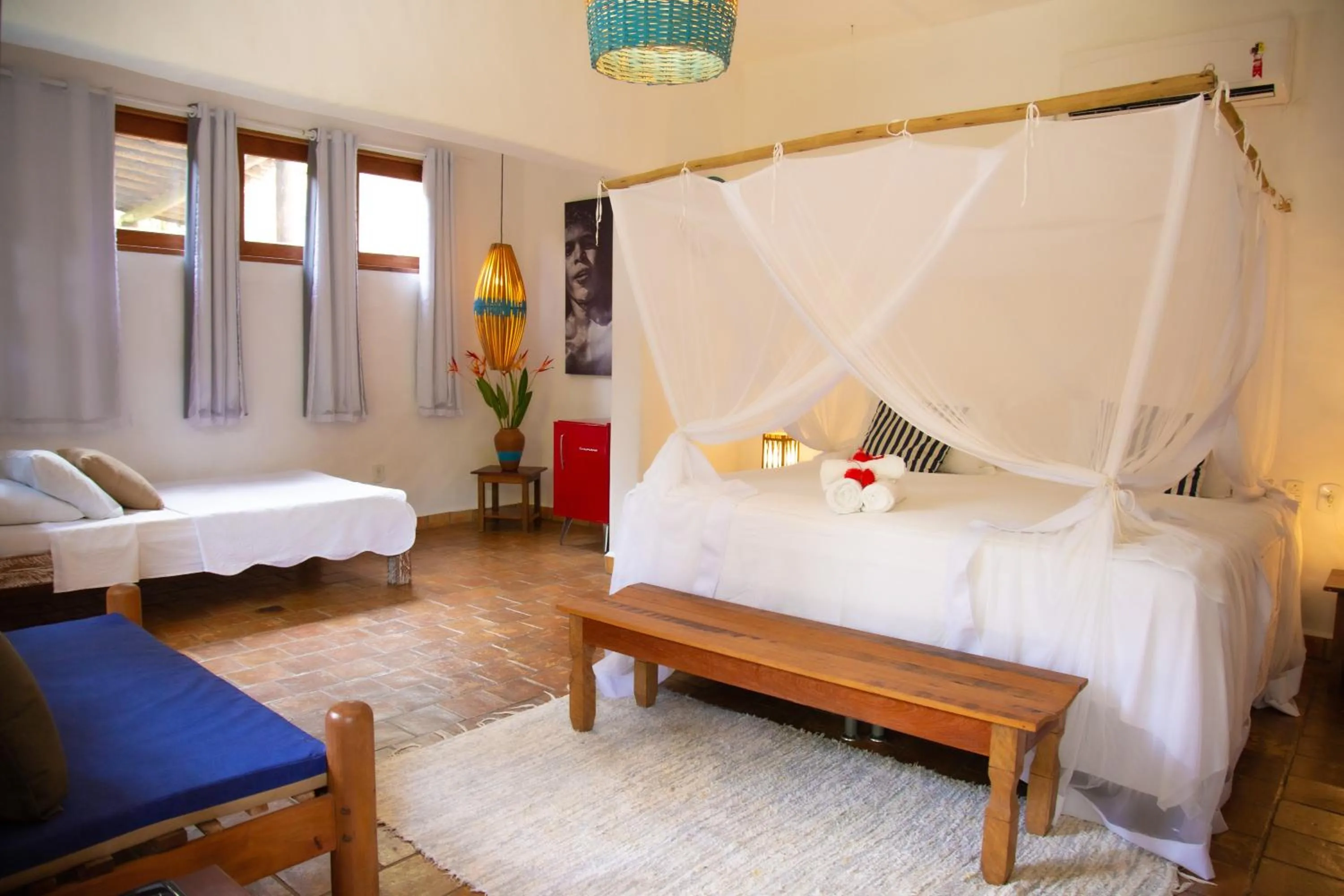 Bed in Pousada Le Refuge
