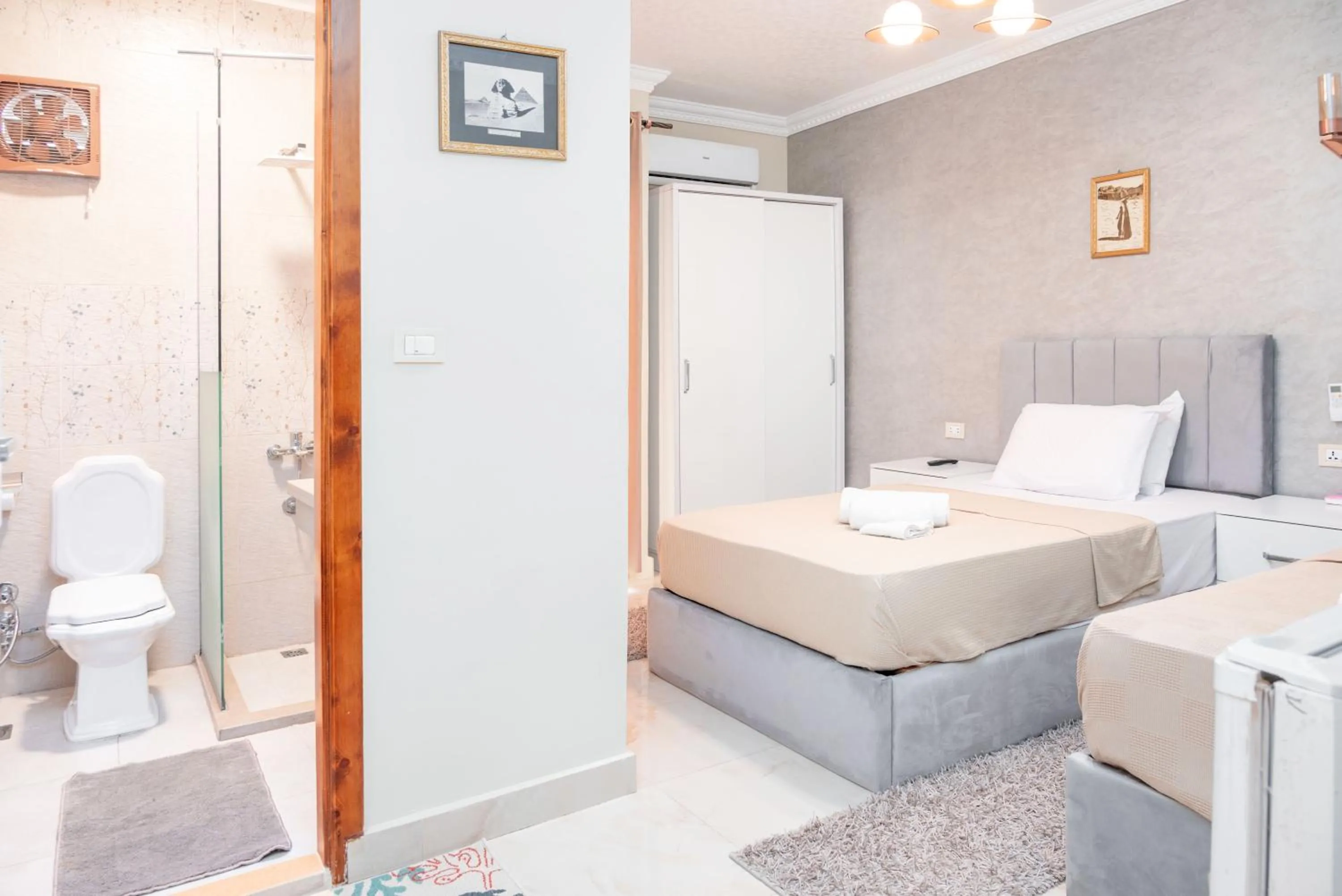 Toilet, Bed in GEM VIEW INN