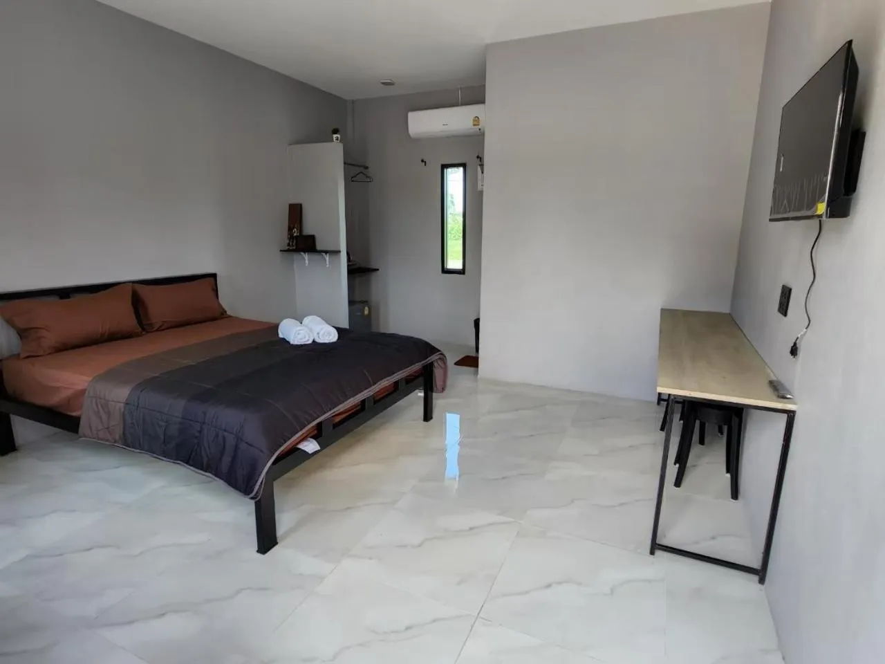 Bed in เช็คอินรีสอร์ท Check-in Resort