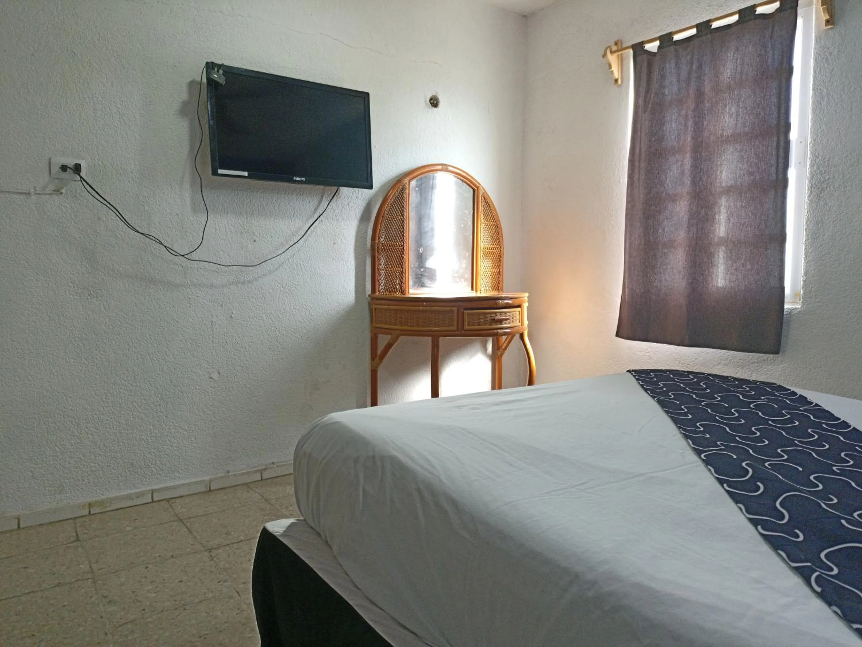 Bed in Hotel Tropical