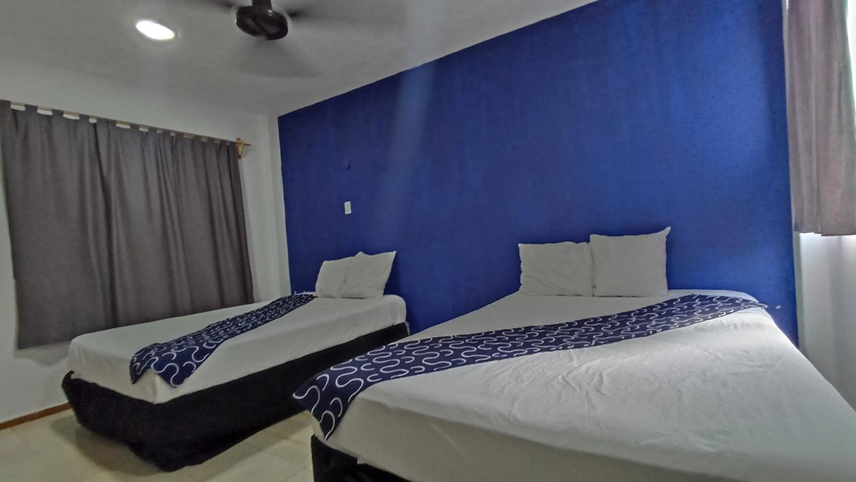 Bed in Hotel Tropical