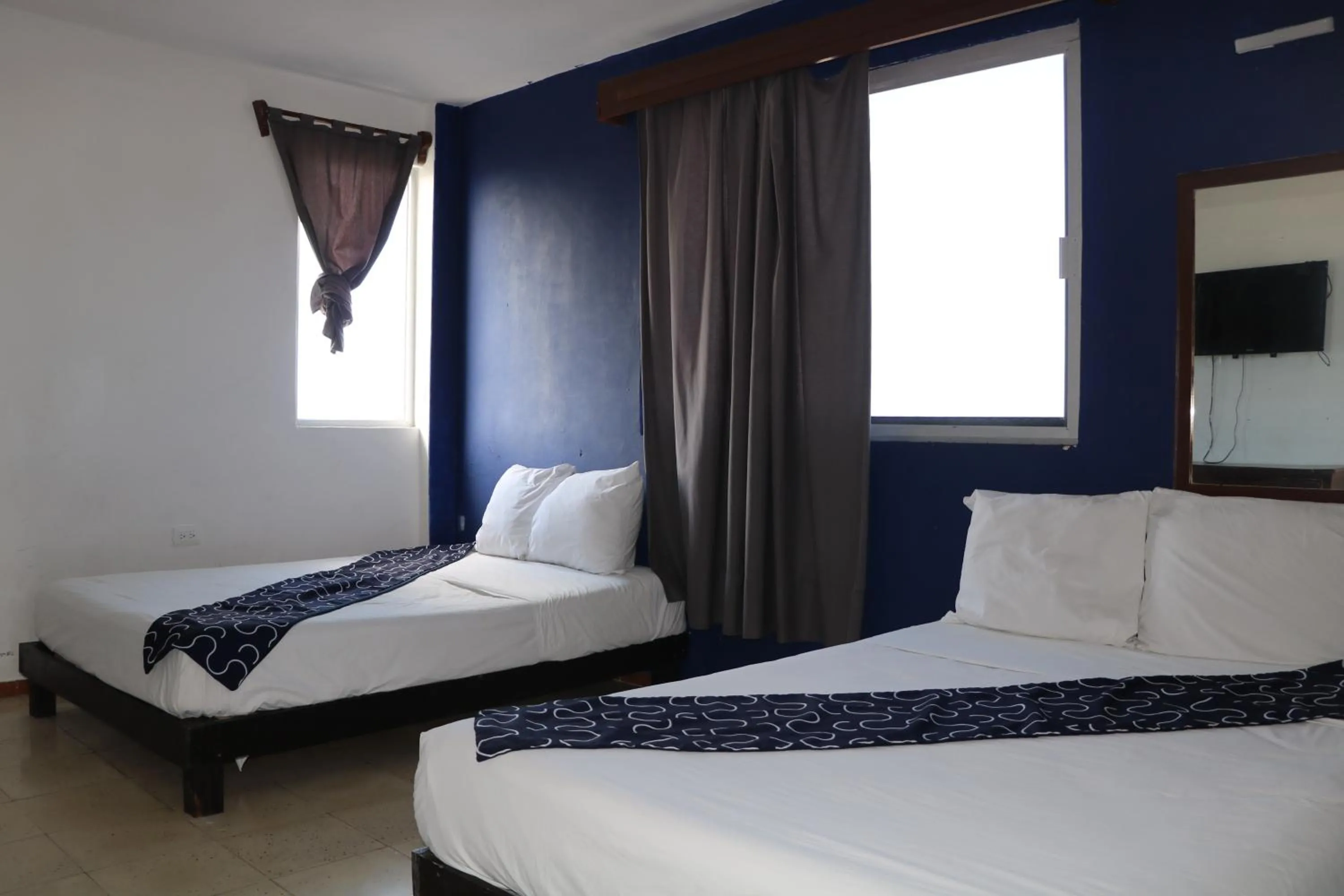 Bed in Hotel Tropical