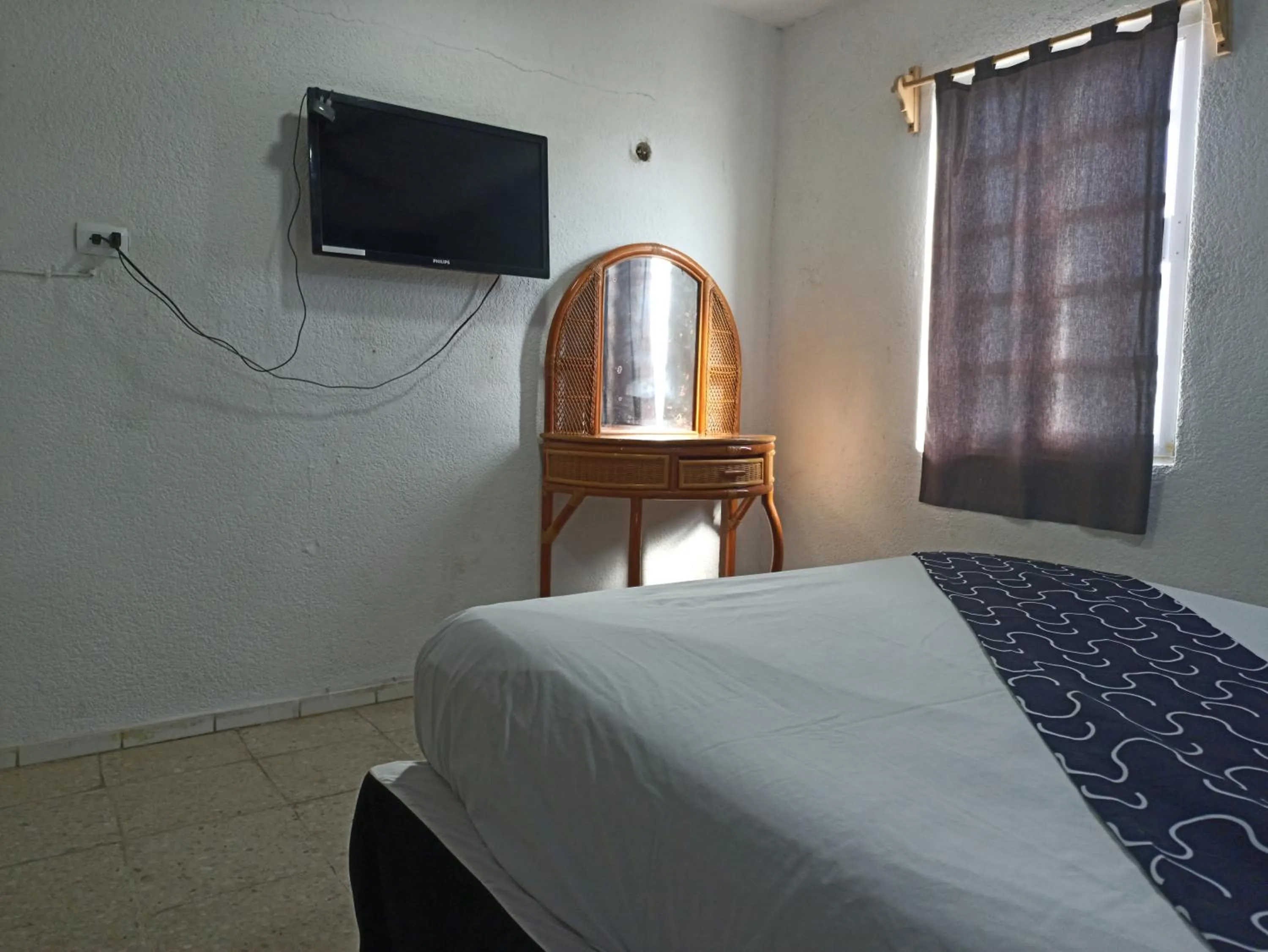 Bed in Hotel Tropical