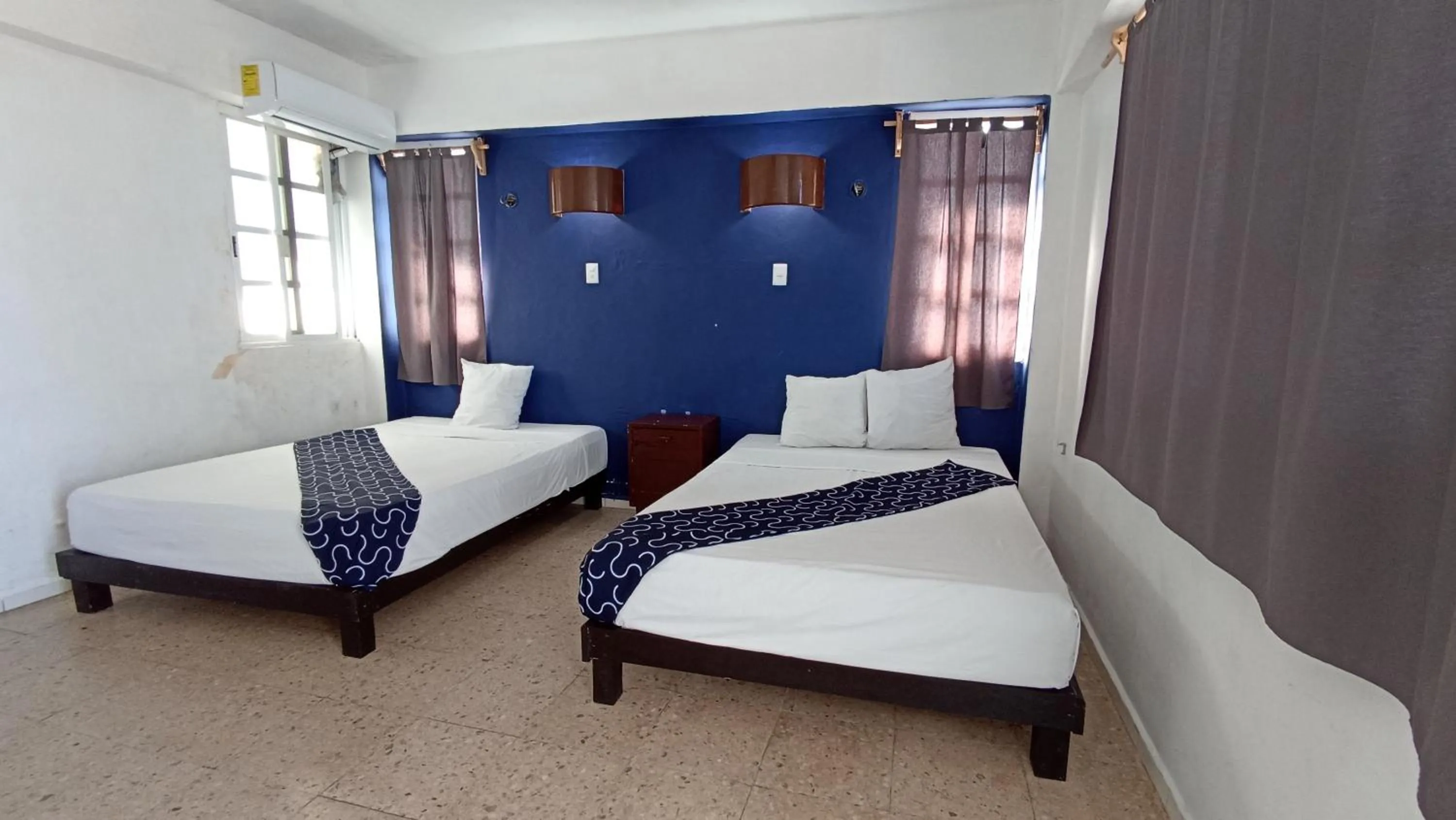 Bed in Hotel Tropical