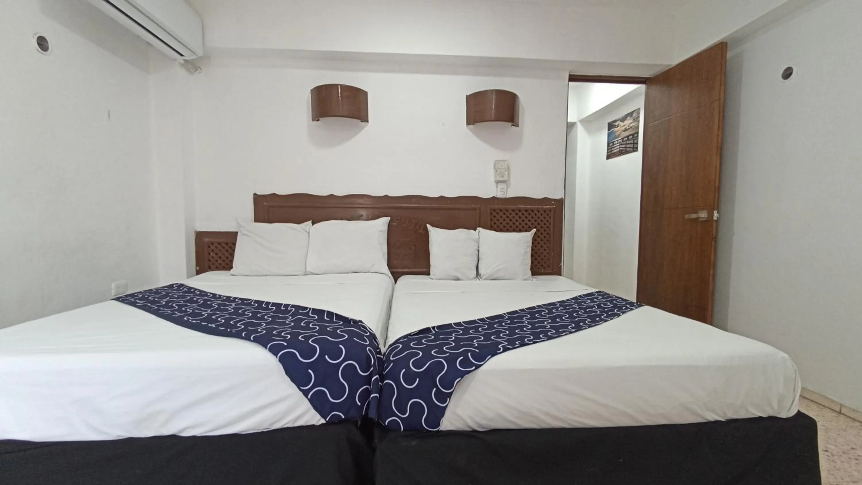 Bed in Hotel Tropical