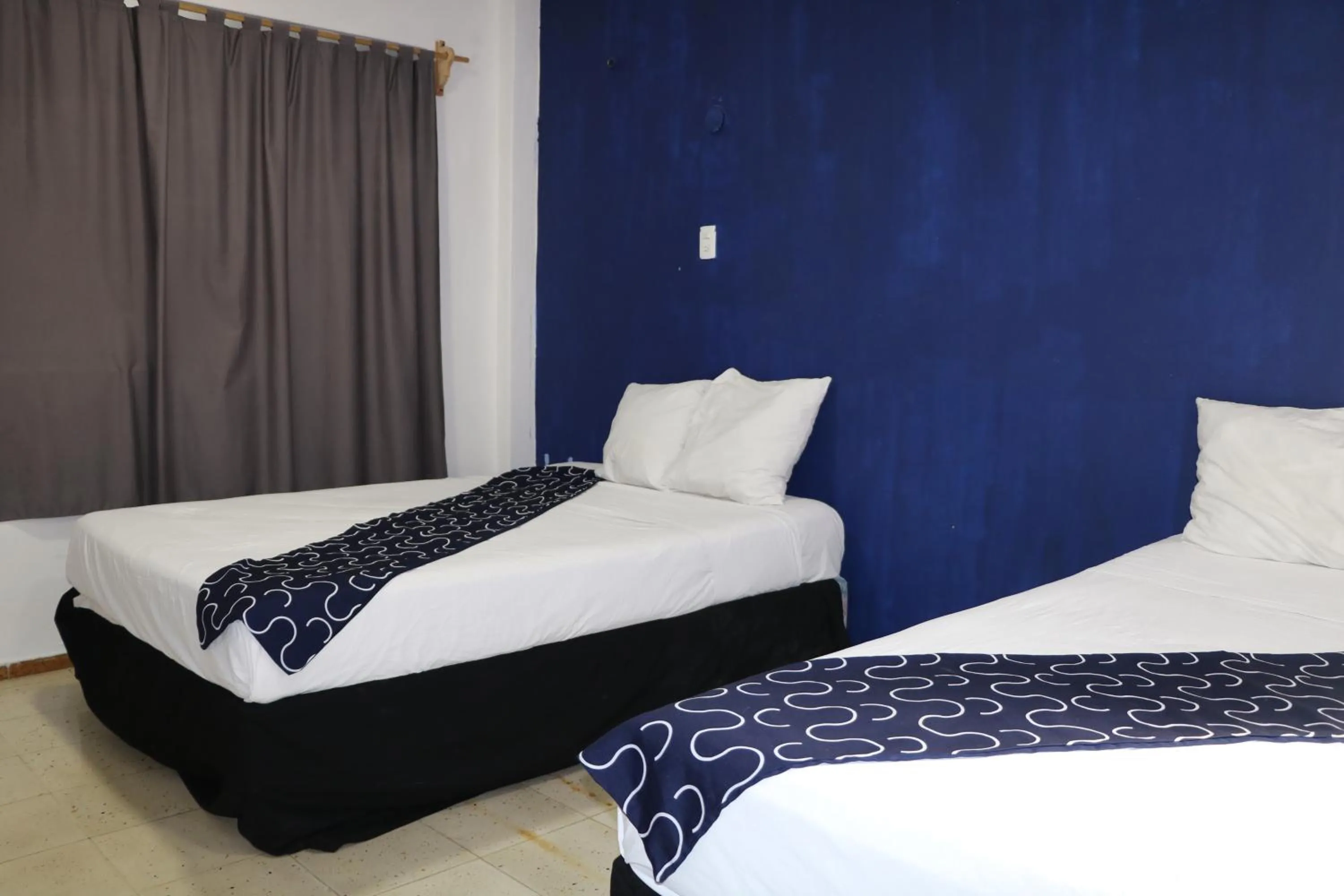 Bed in Hotel Tropical