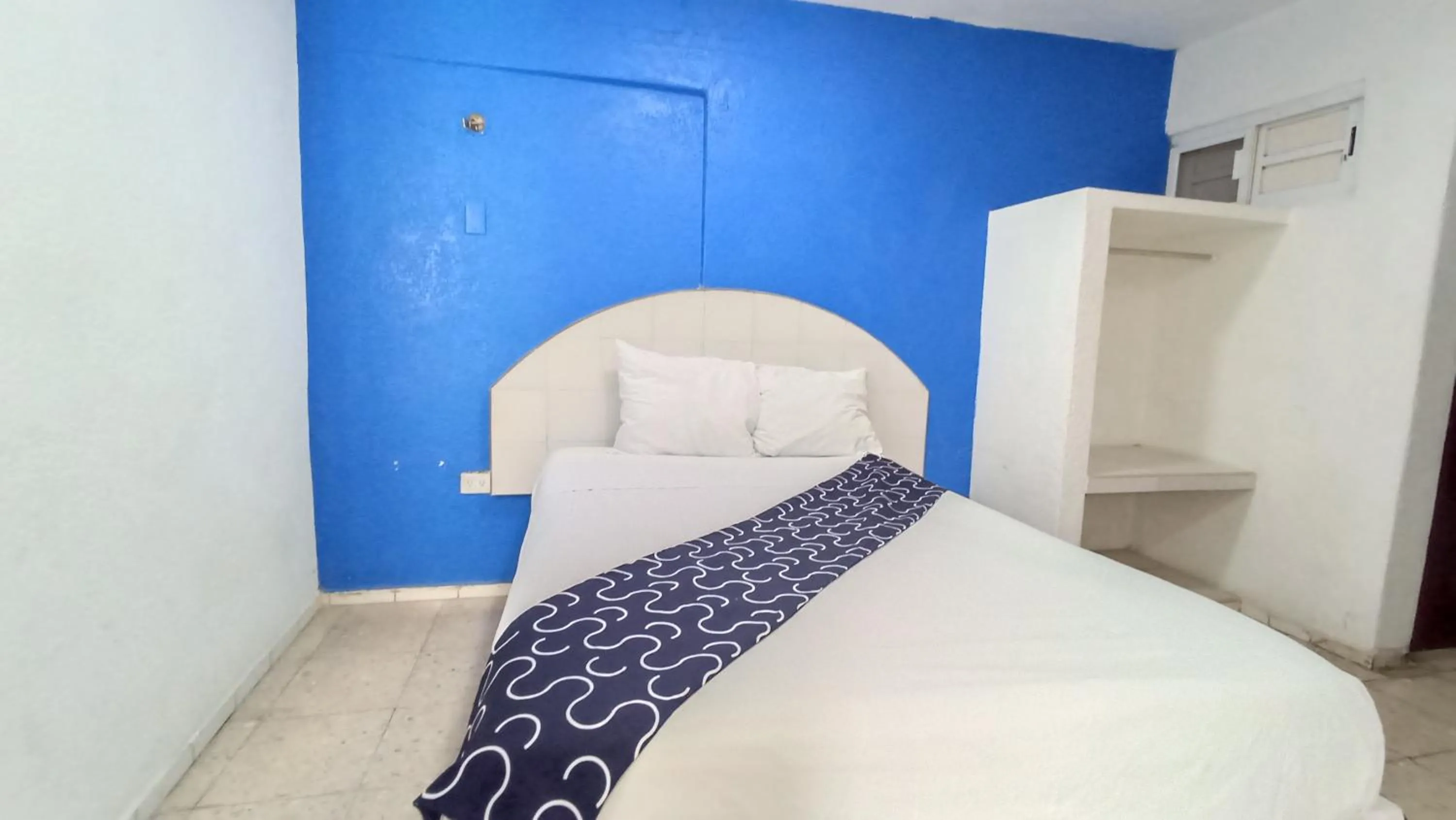 Bed in Hotel Tropical