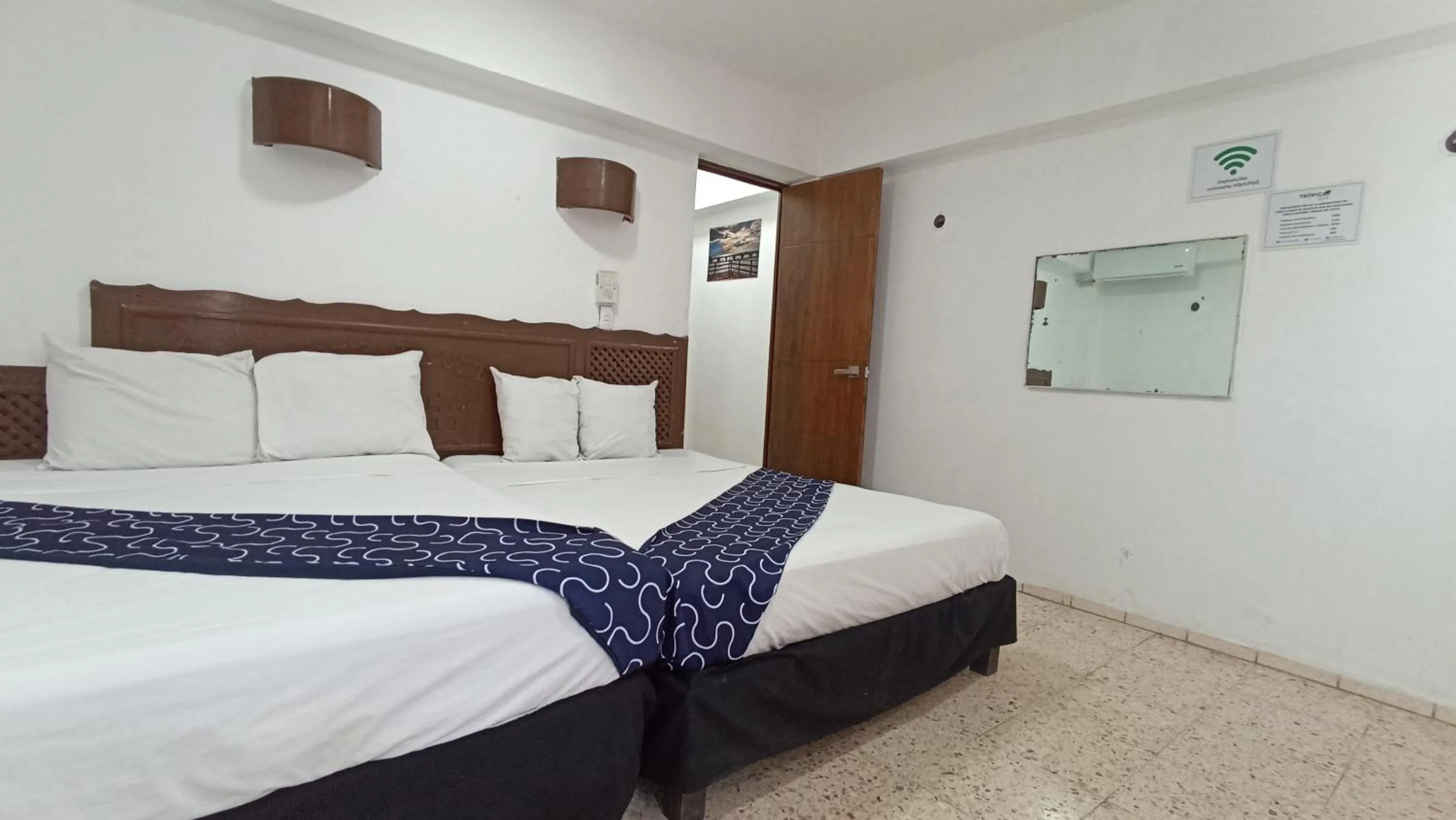 Bed in Hotel Tropical