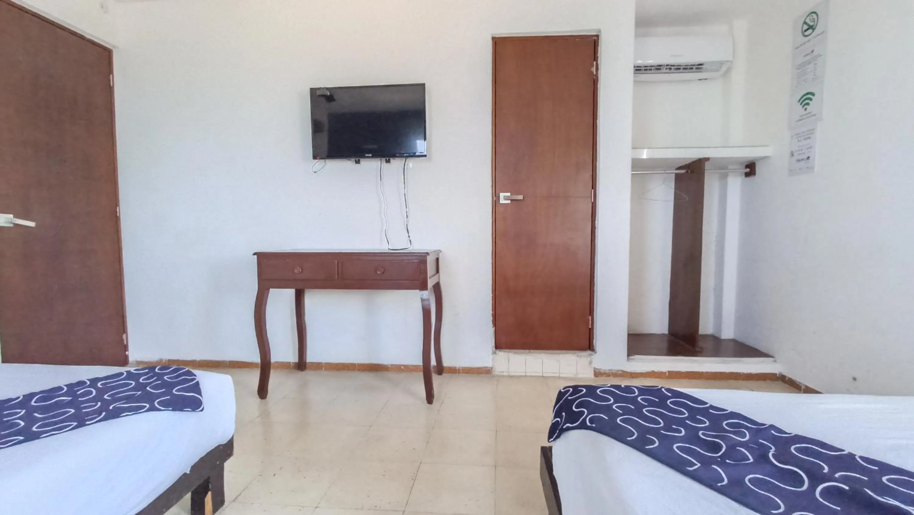 Bed in Hotel Tropical