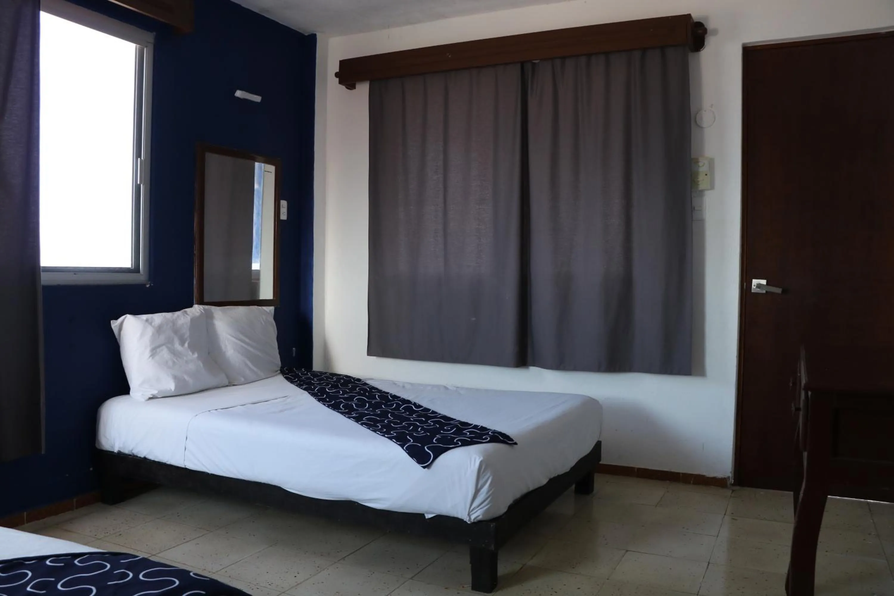 Bed in Hotel Tropical
