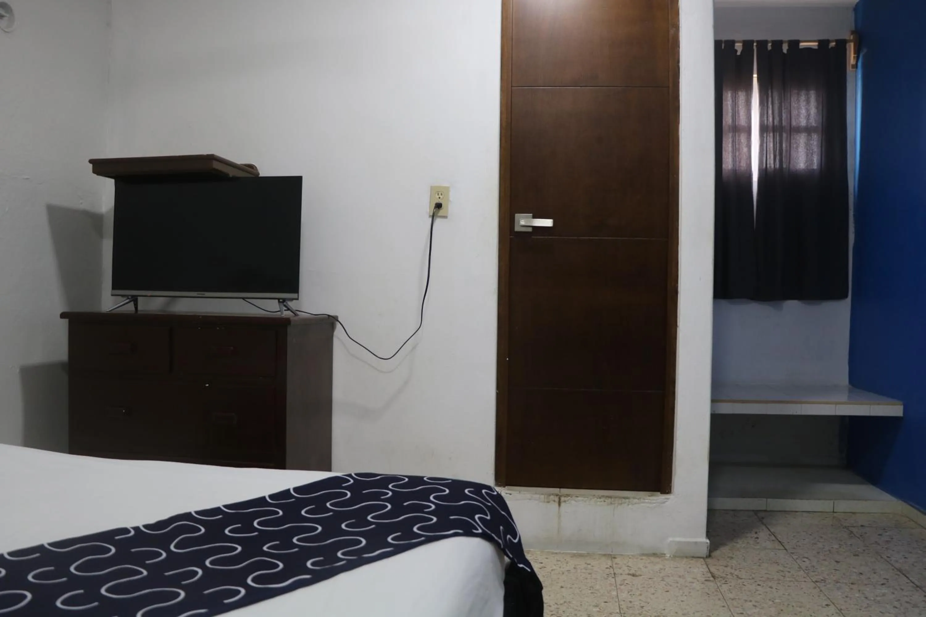 Bed in Hotel Tropical