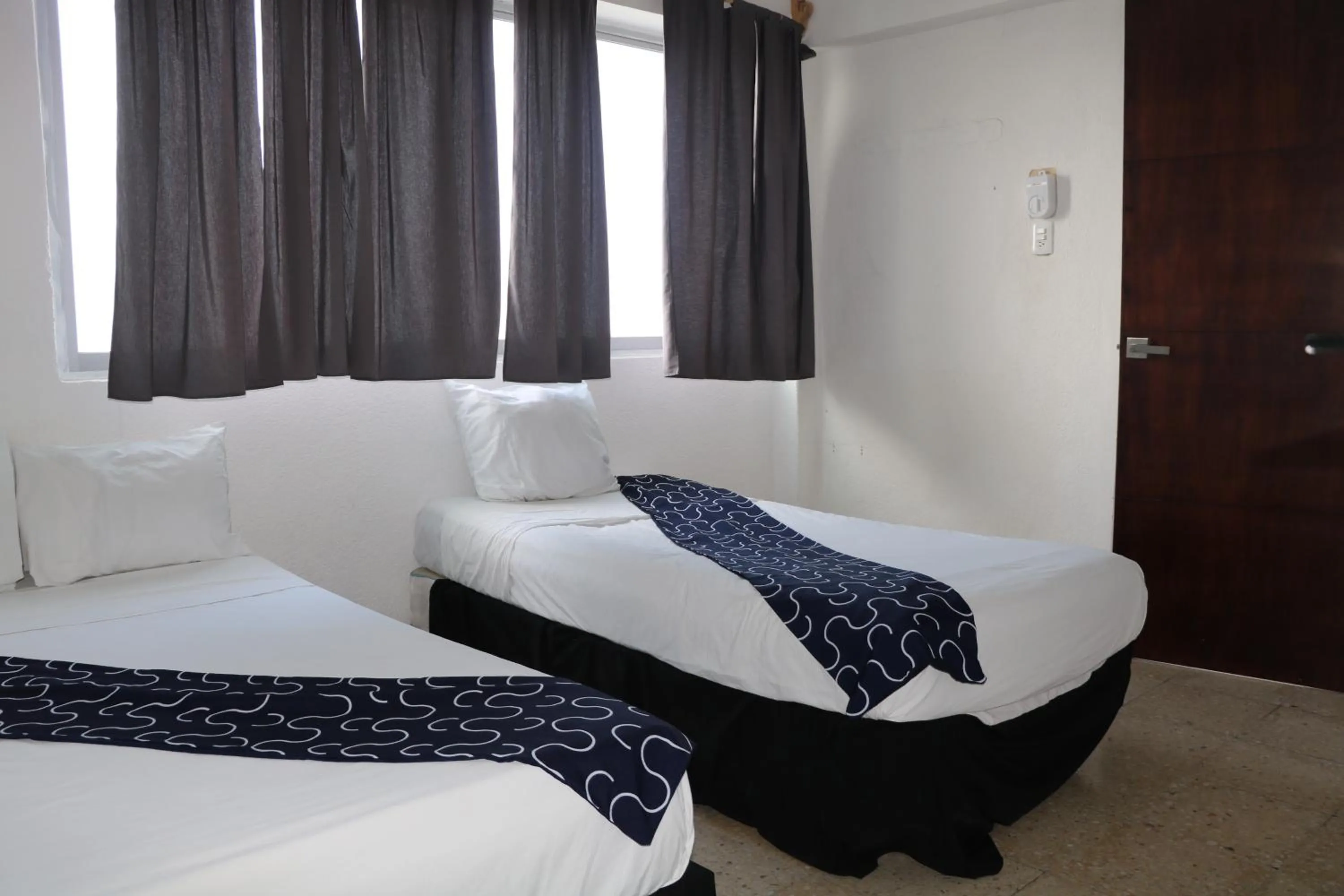 Bed in Hotel Tropical
