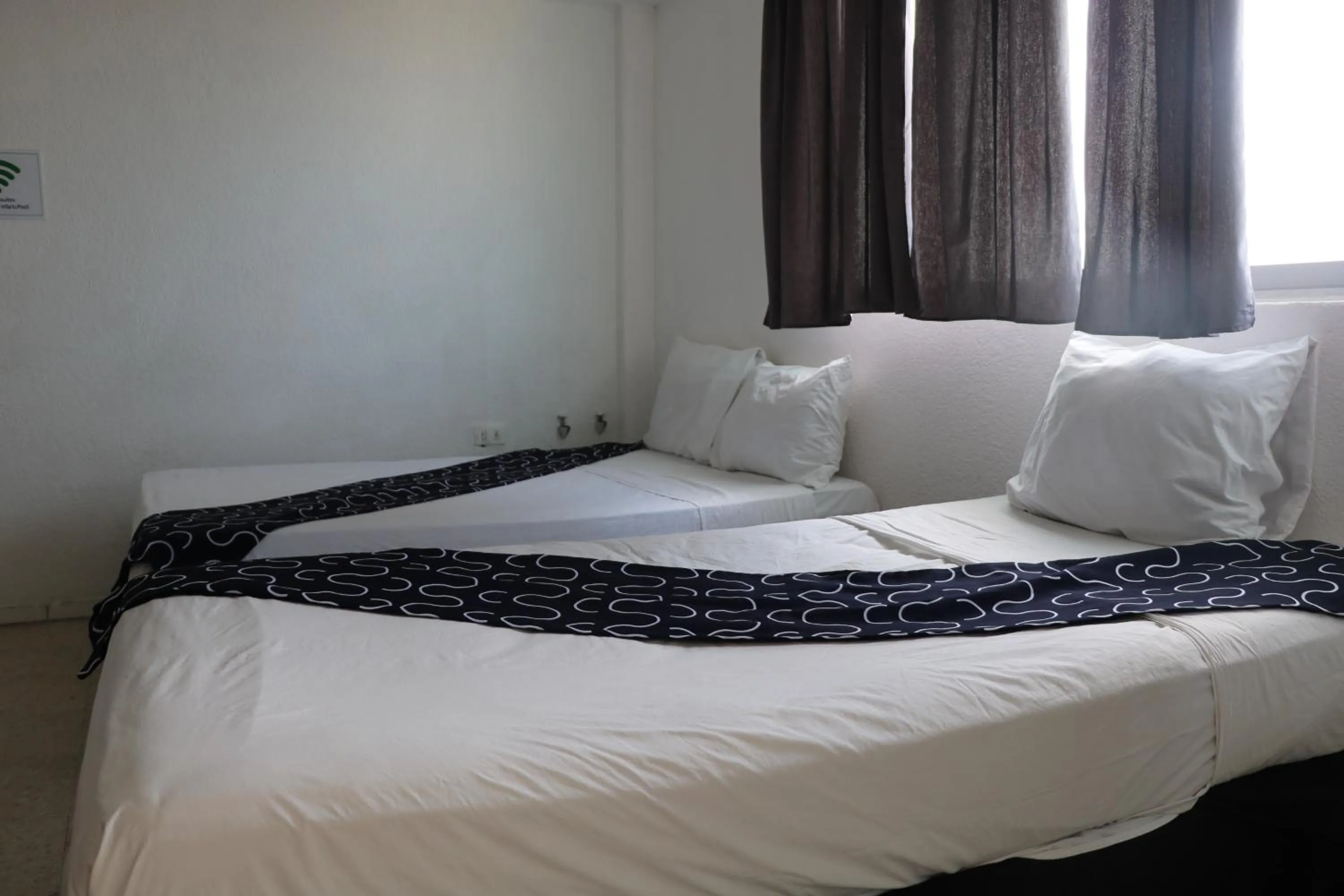 Bed in Hotel Tropical