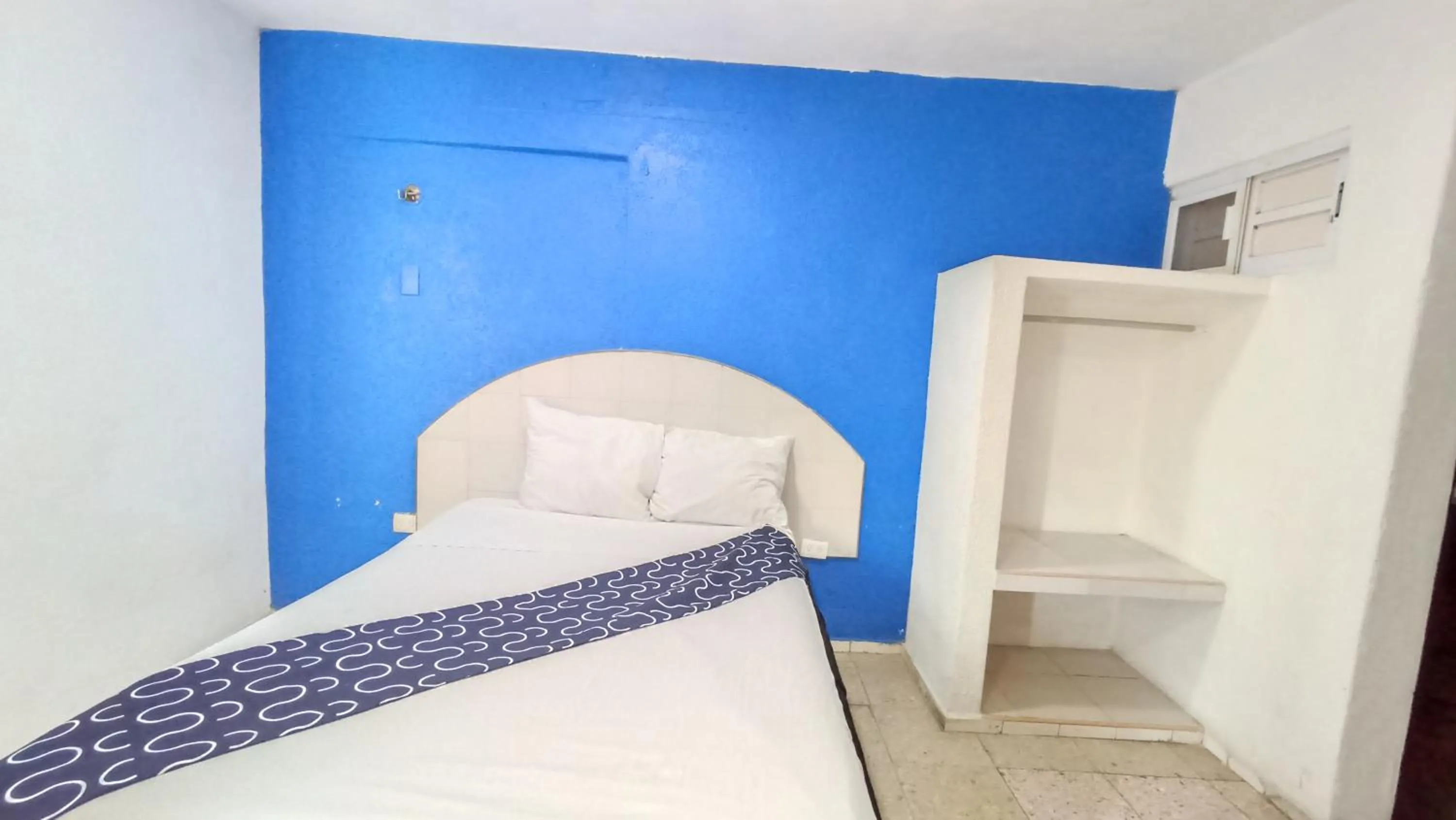 Bed in Hotel Tropical