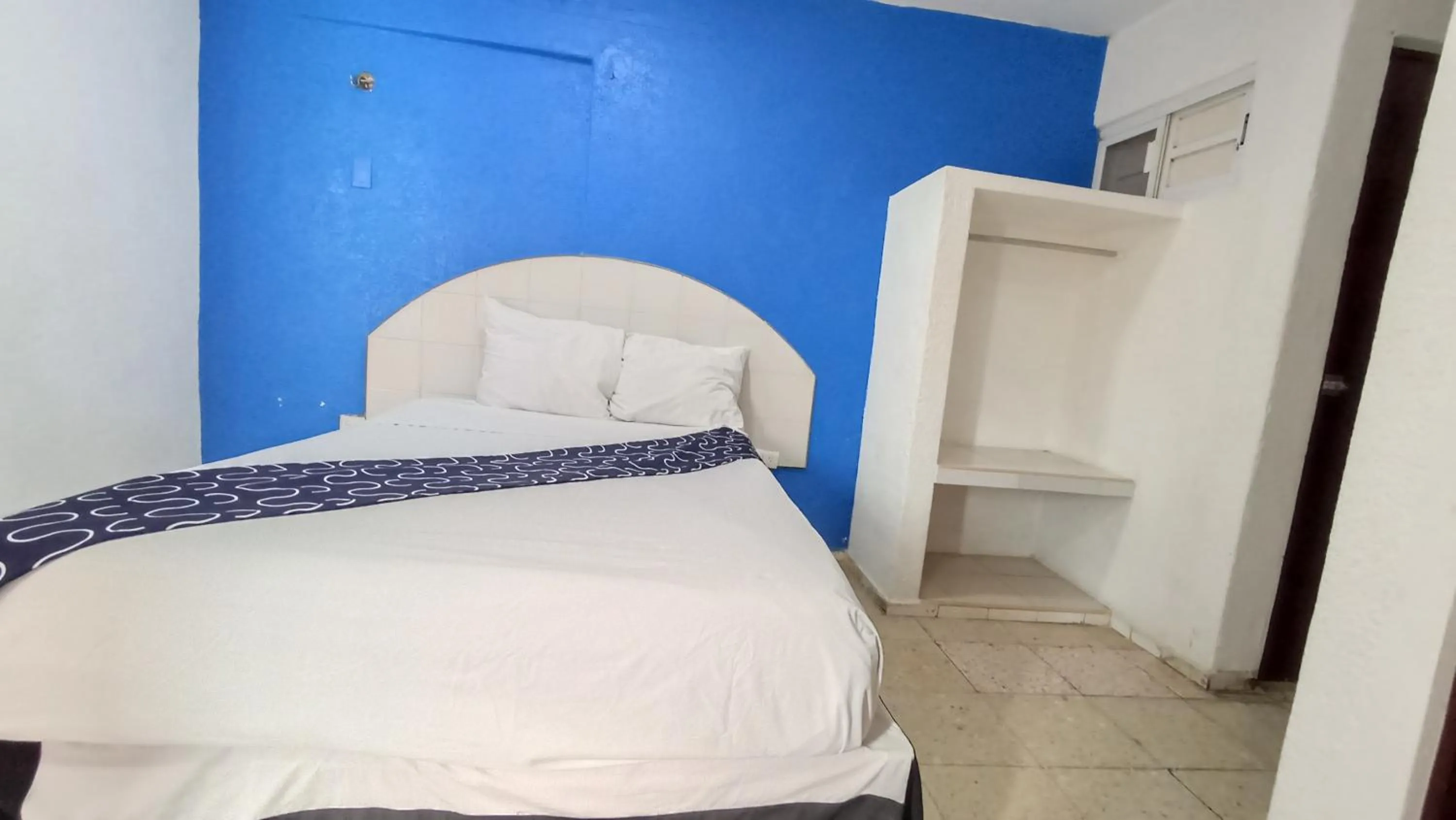 Bed in Hotel Tropical