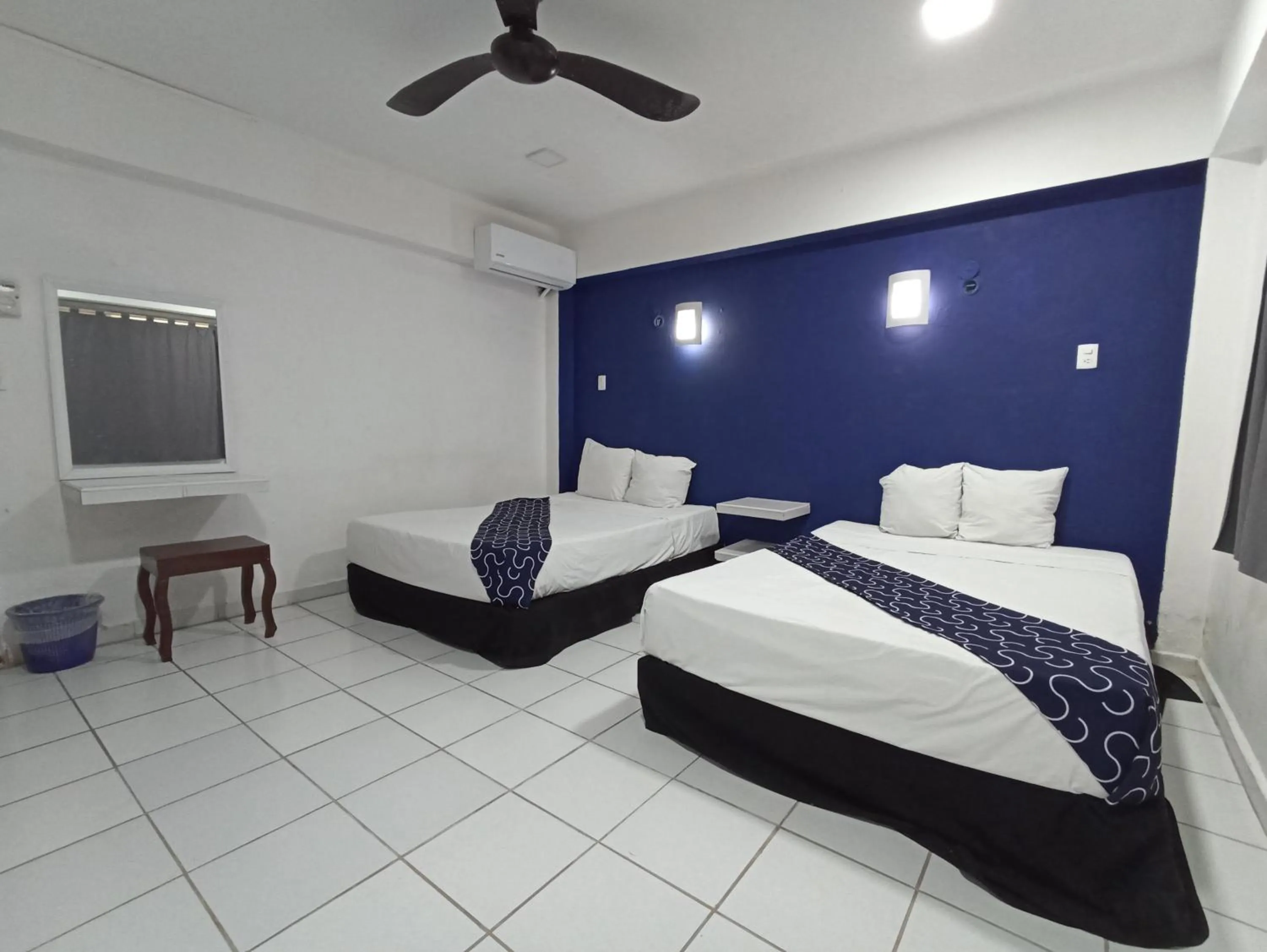 Bed in Hotel Tropical