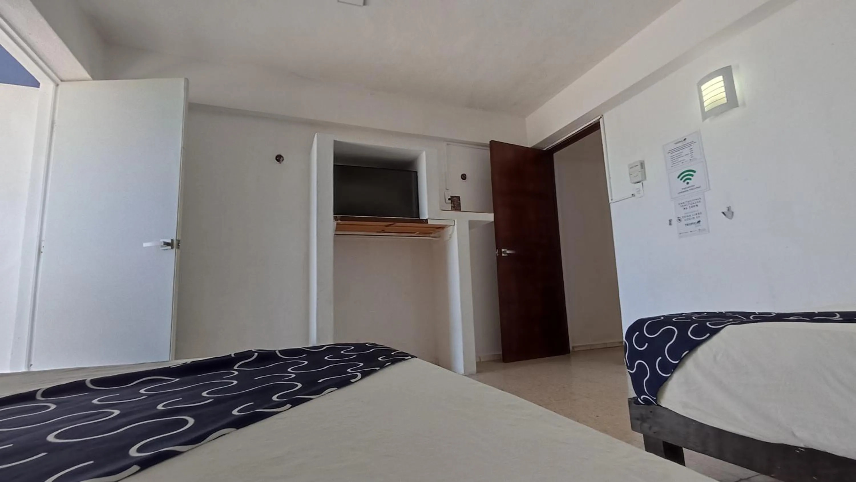 Bed in Hotel Tropical